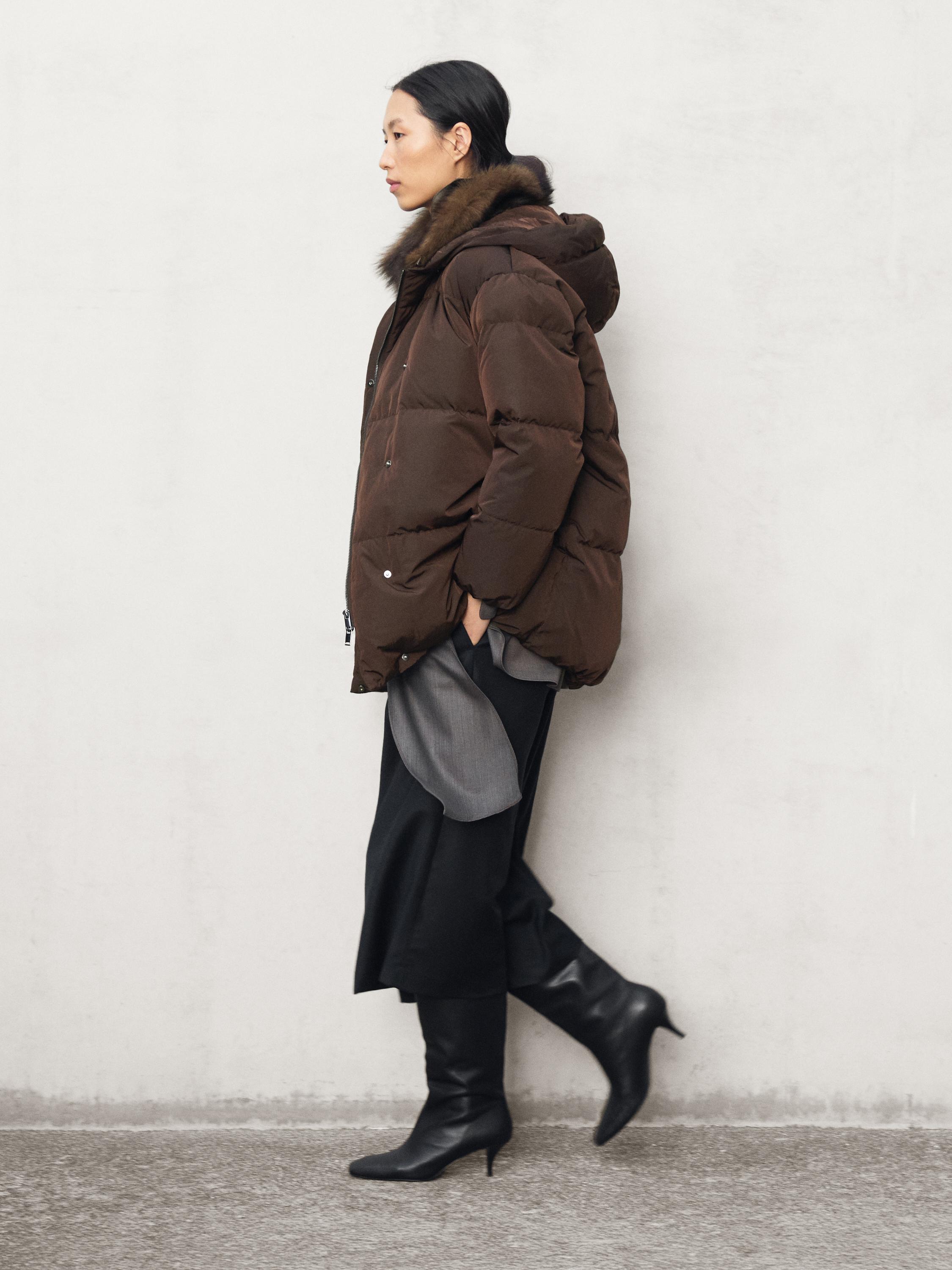 Veekindel kapuutsiga tepitud jope