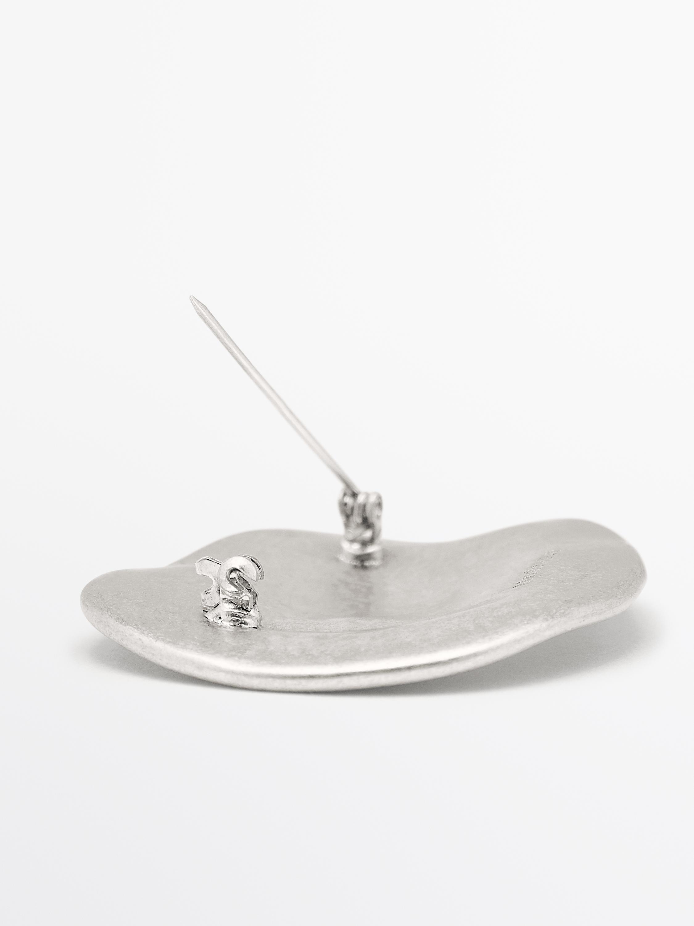 Almond brooch
