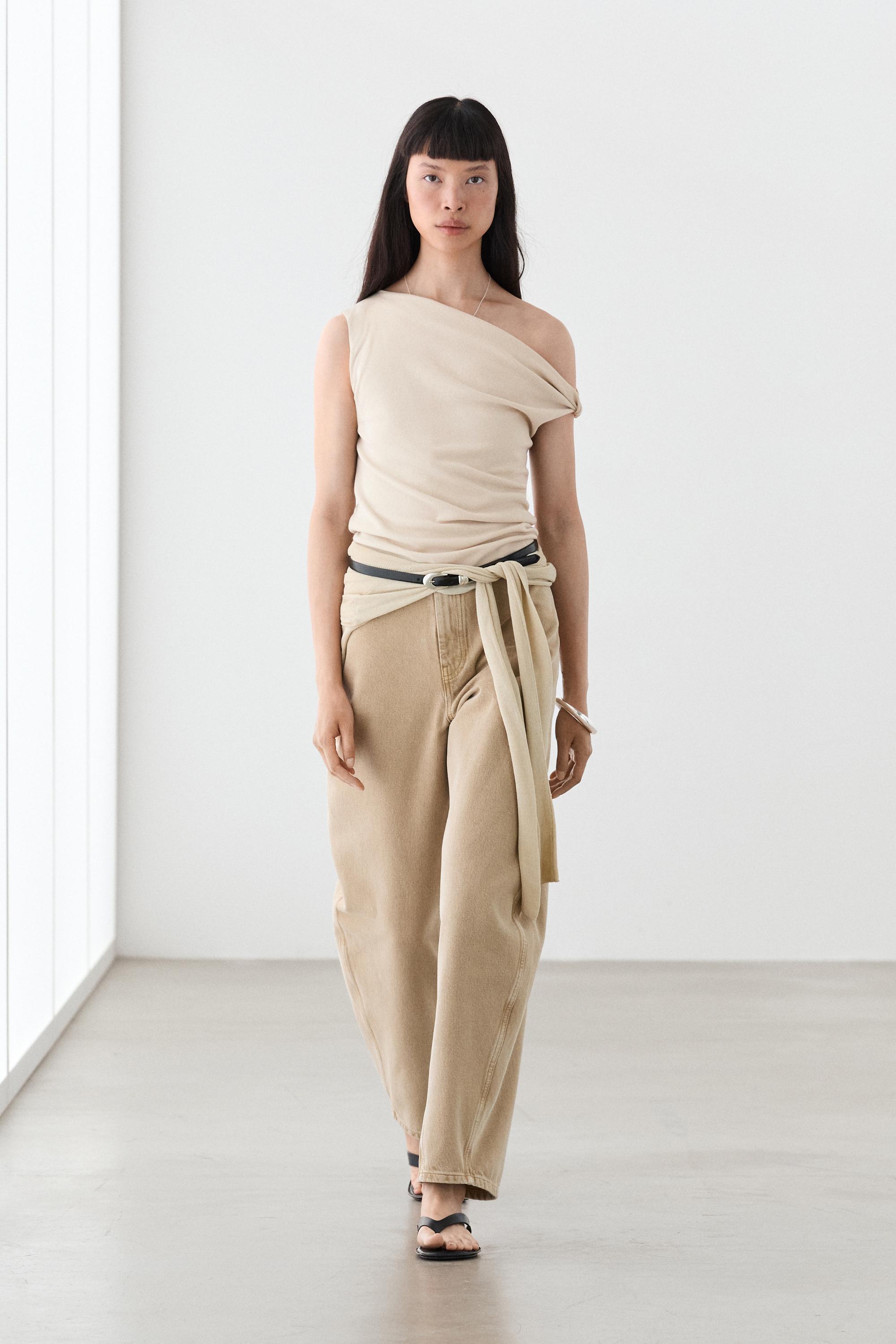 Asymmetric drop sleeve top