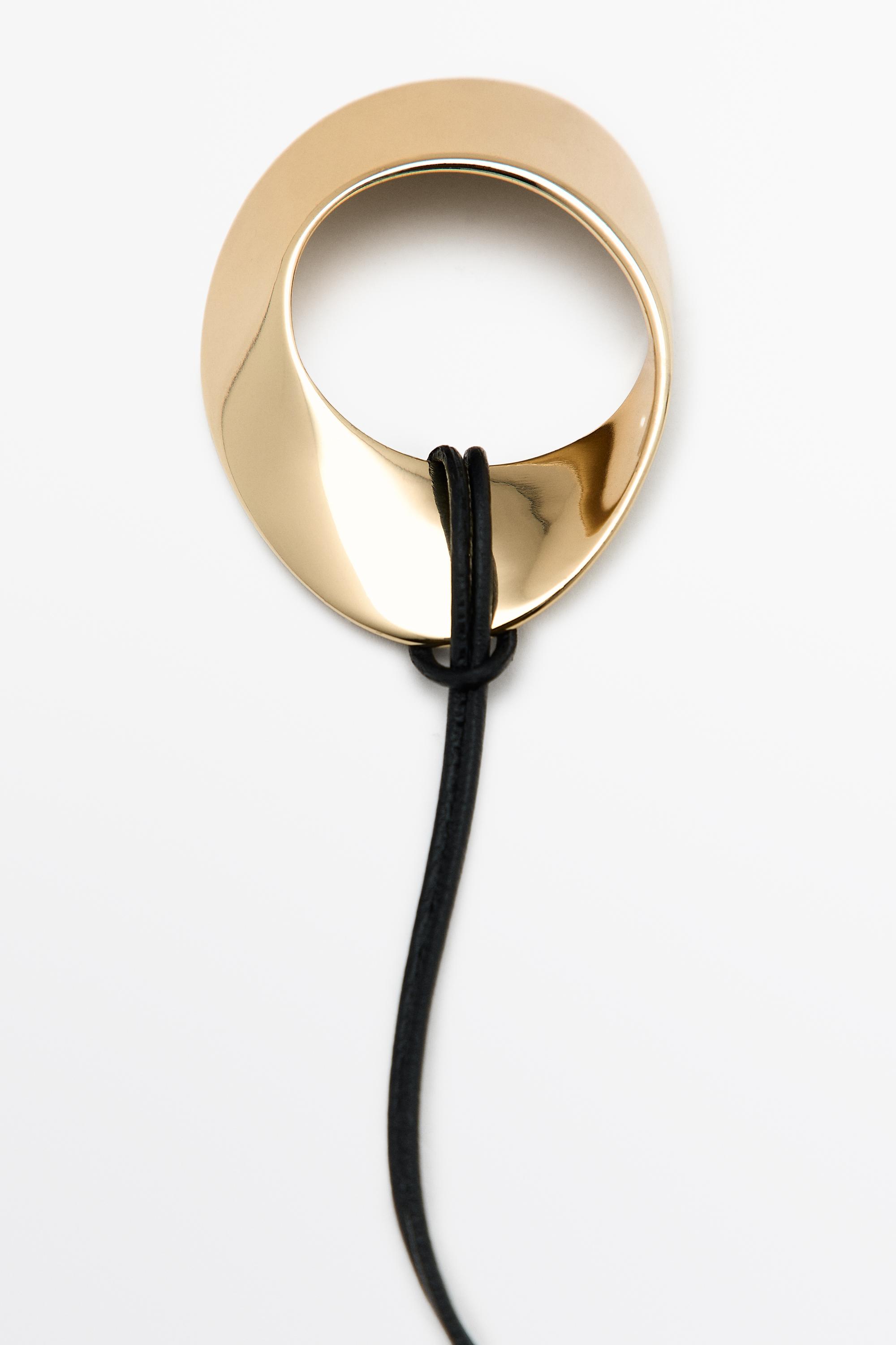 Twist hoop necklace — GOLDEN