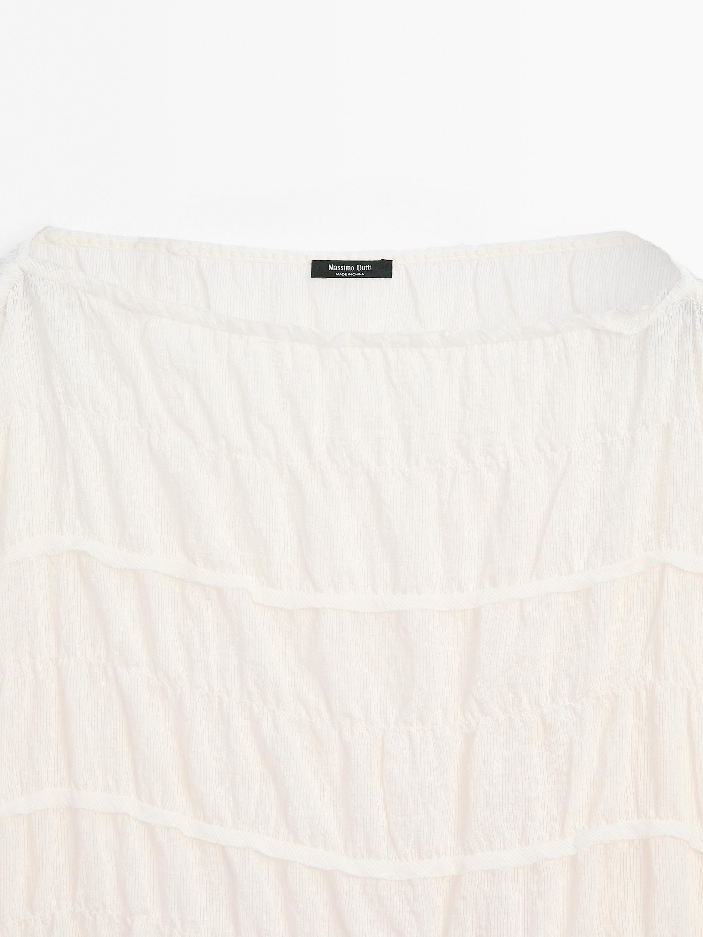 Flowing blouse with gathered detail