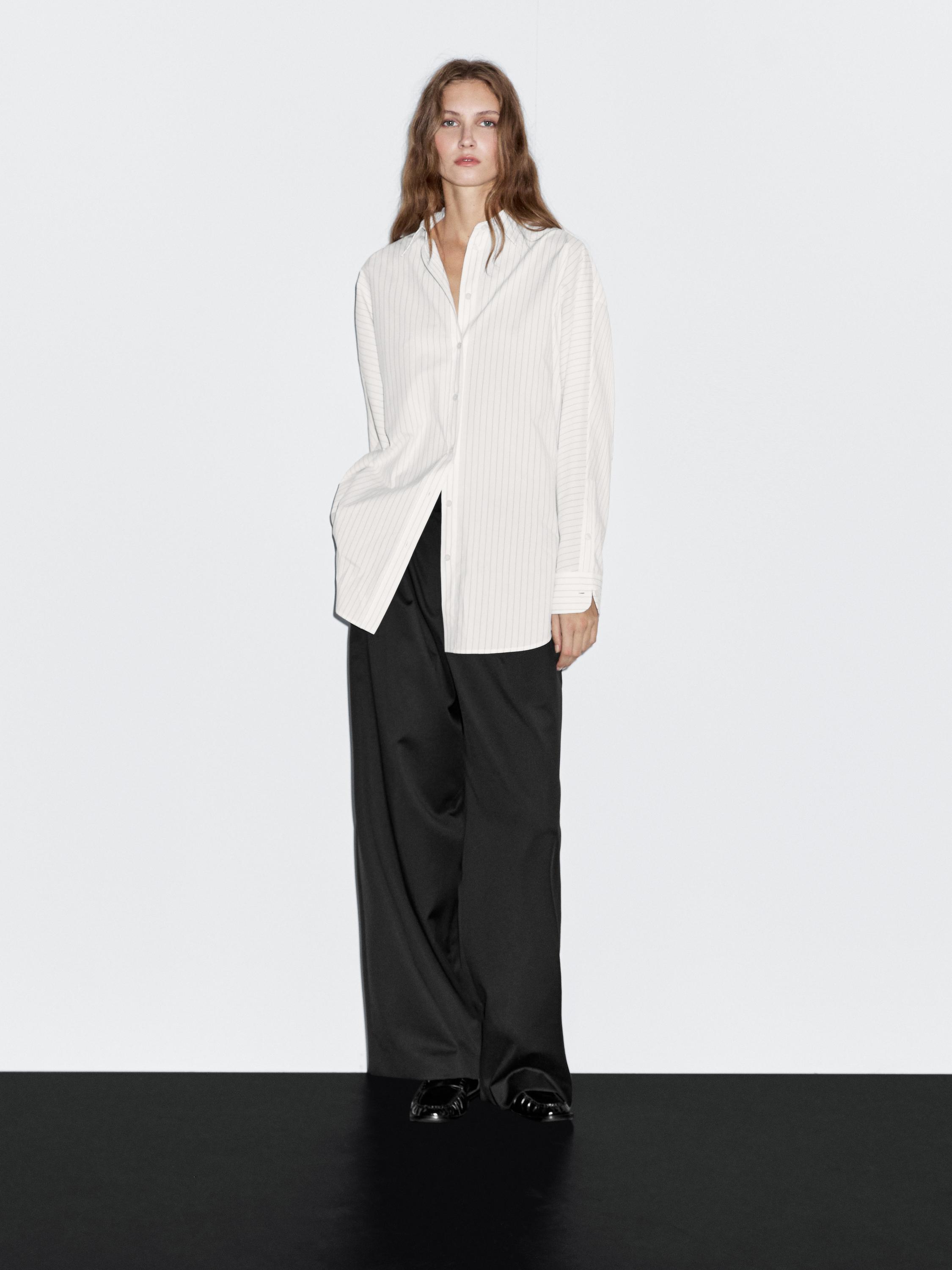 Chemisier à rayures et manches chauve-souris