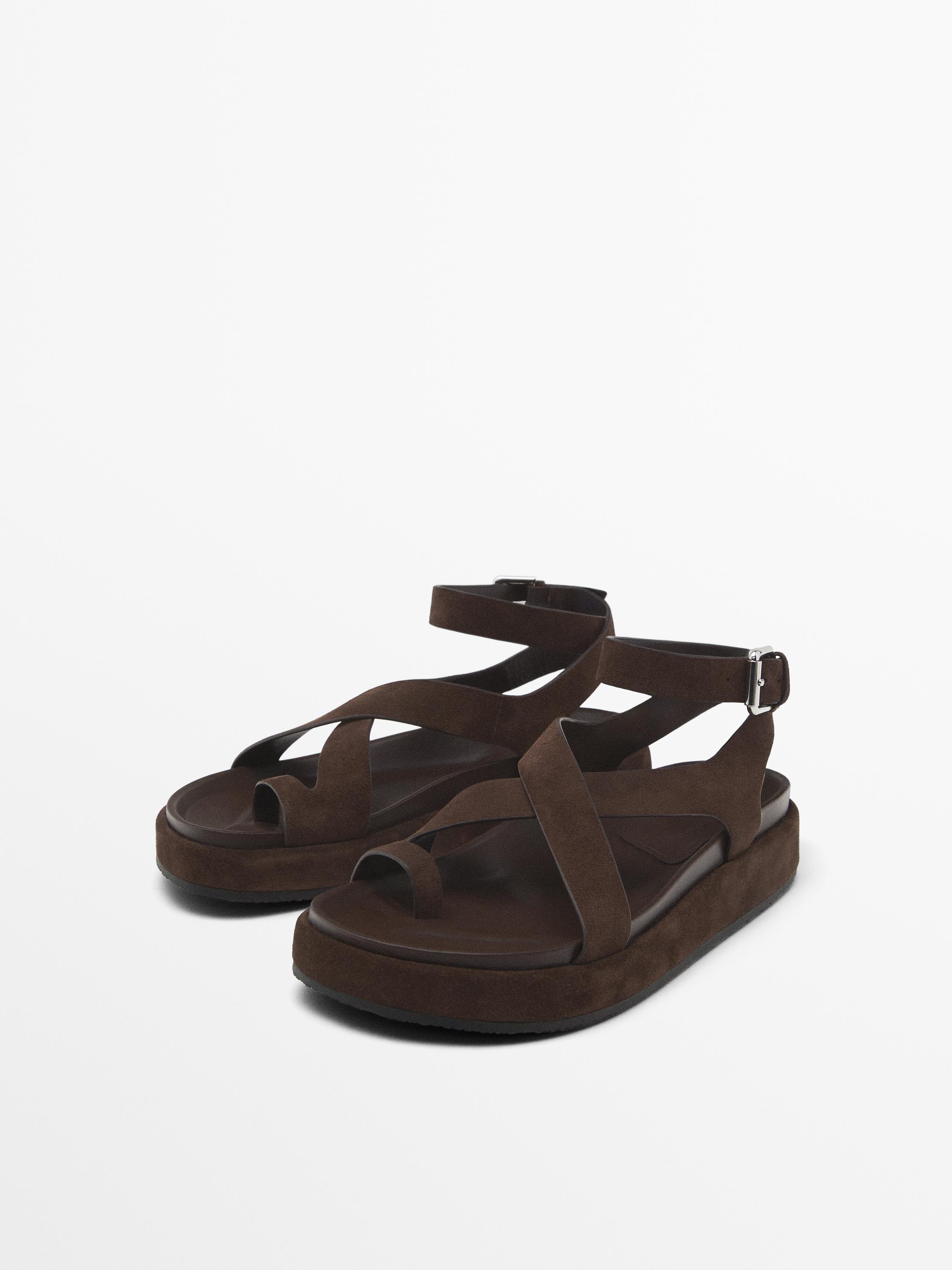 Sandals with crossover straps