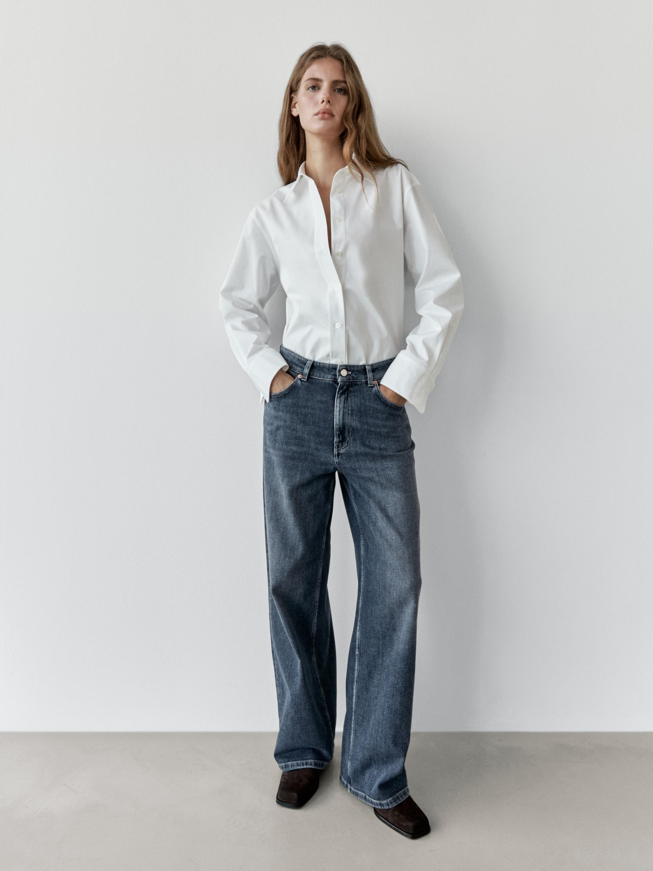 Xhinse me shtat të mesëm këmbëgjerë me masë të lirshme