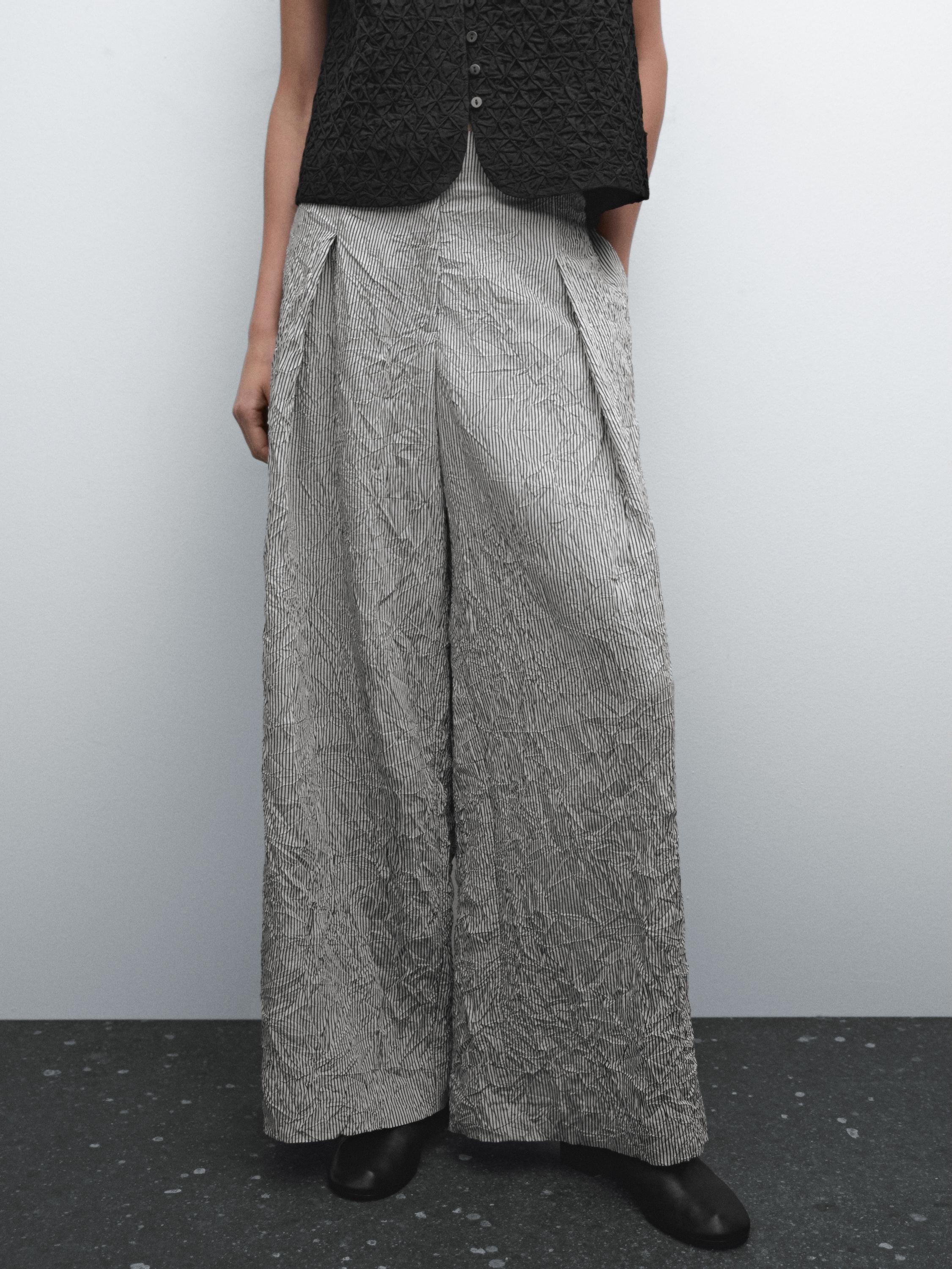 Striped voluminous fabric trousers
