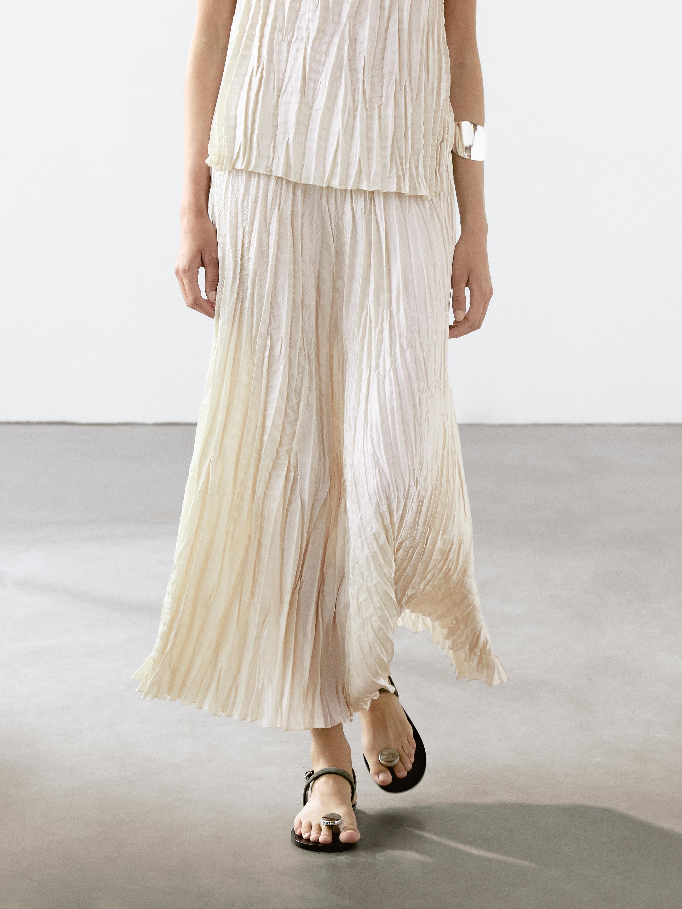 Flowing pleated midi skirt