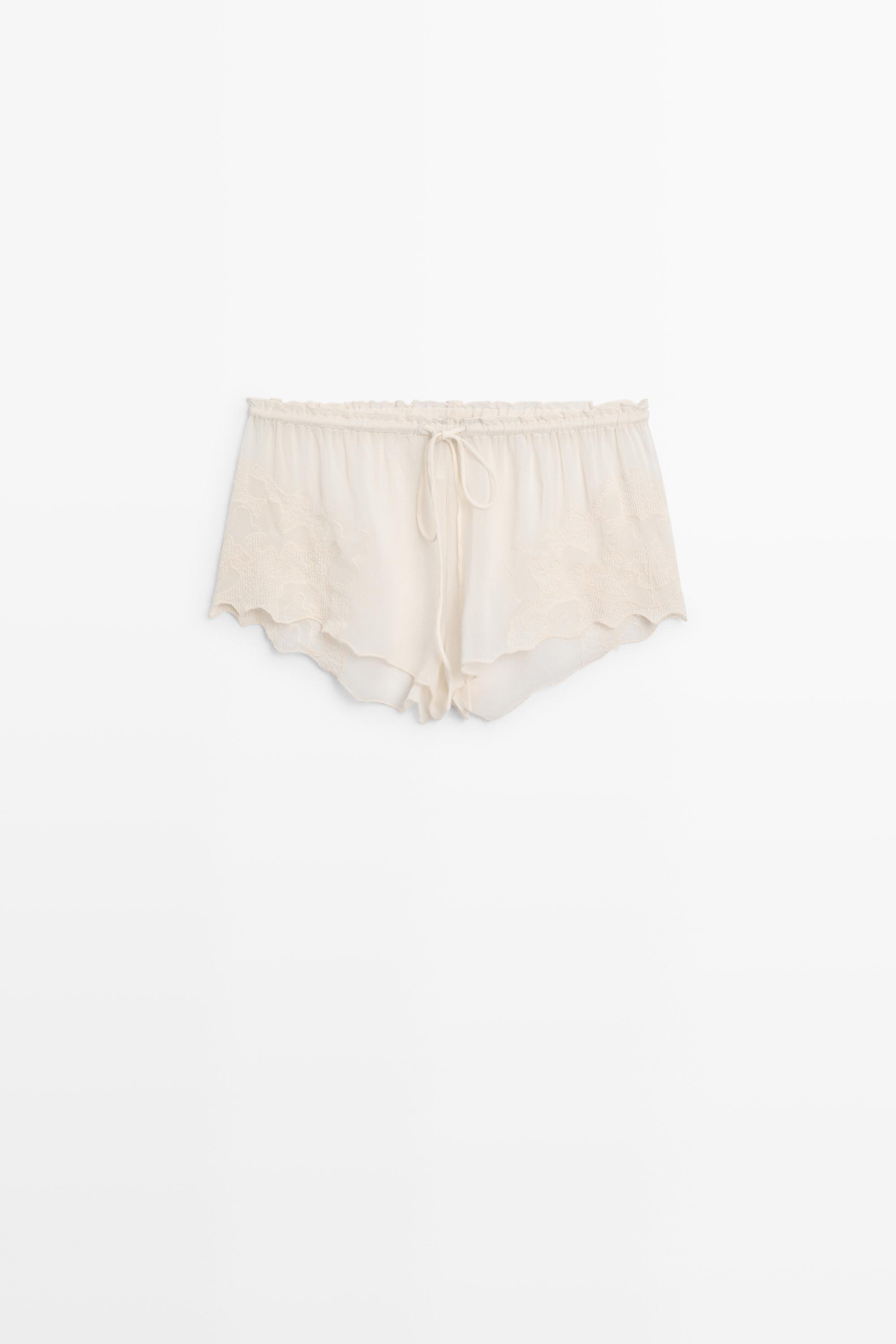 Flowing shorts with embroidered detail — CREAM