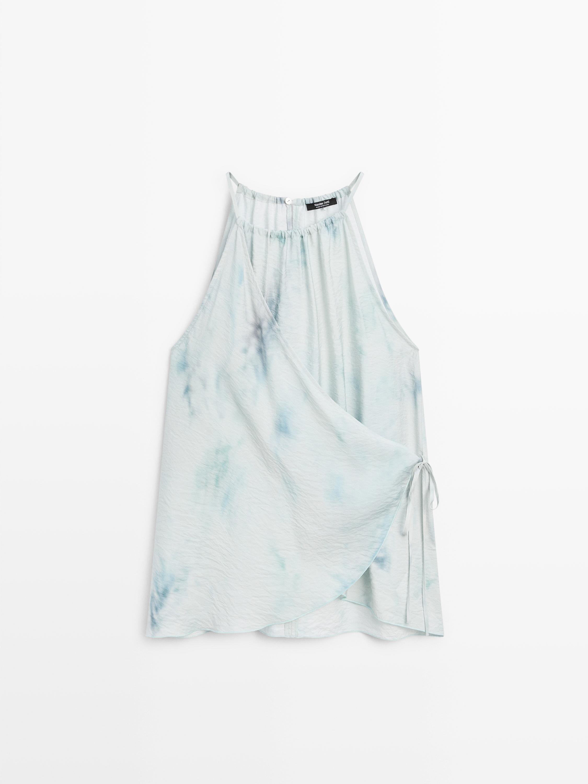 Top fluido cuello halter detalle lazada