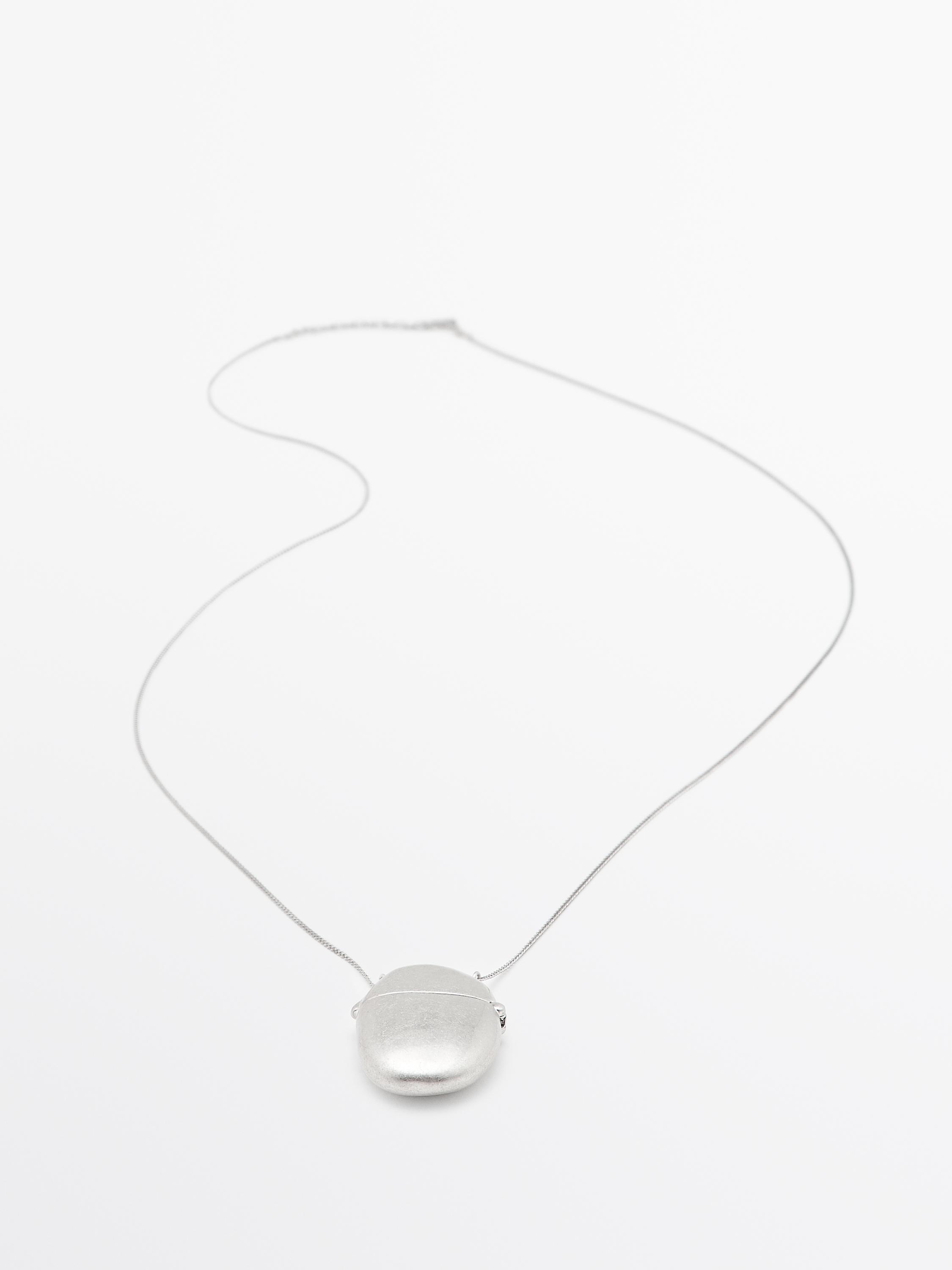 Necklace with oval box pendant
