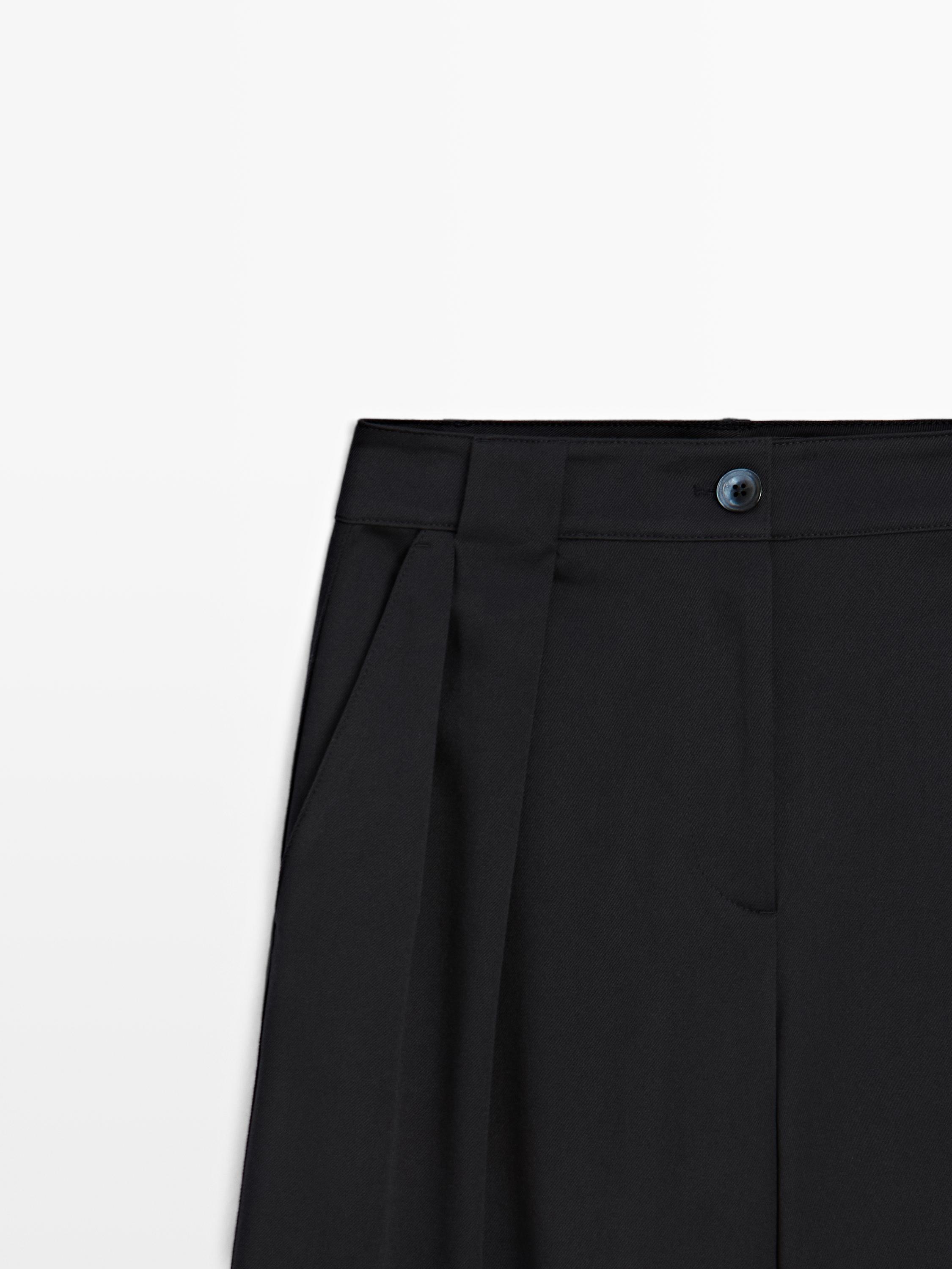 Pantalons de pinces cama ampla