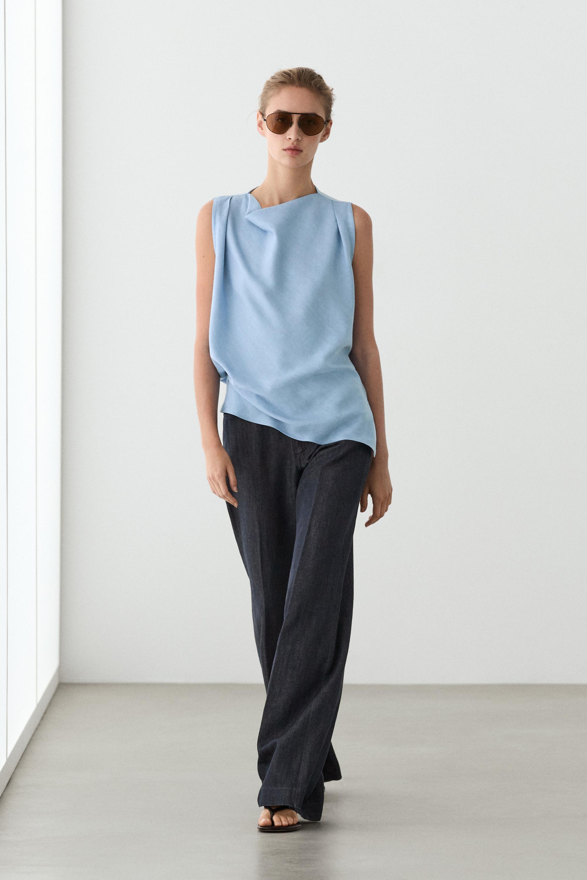 Top fluido detalle pliegues con lino