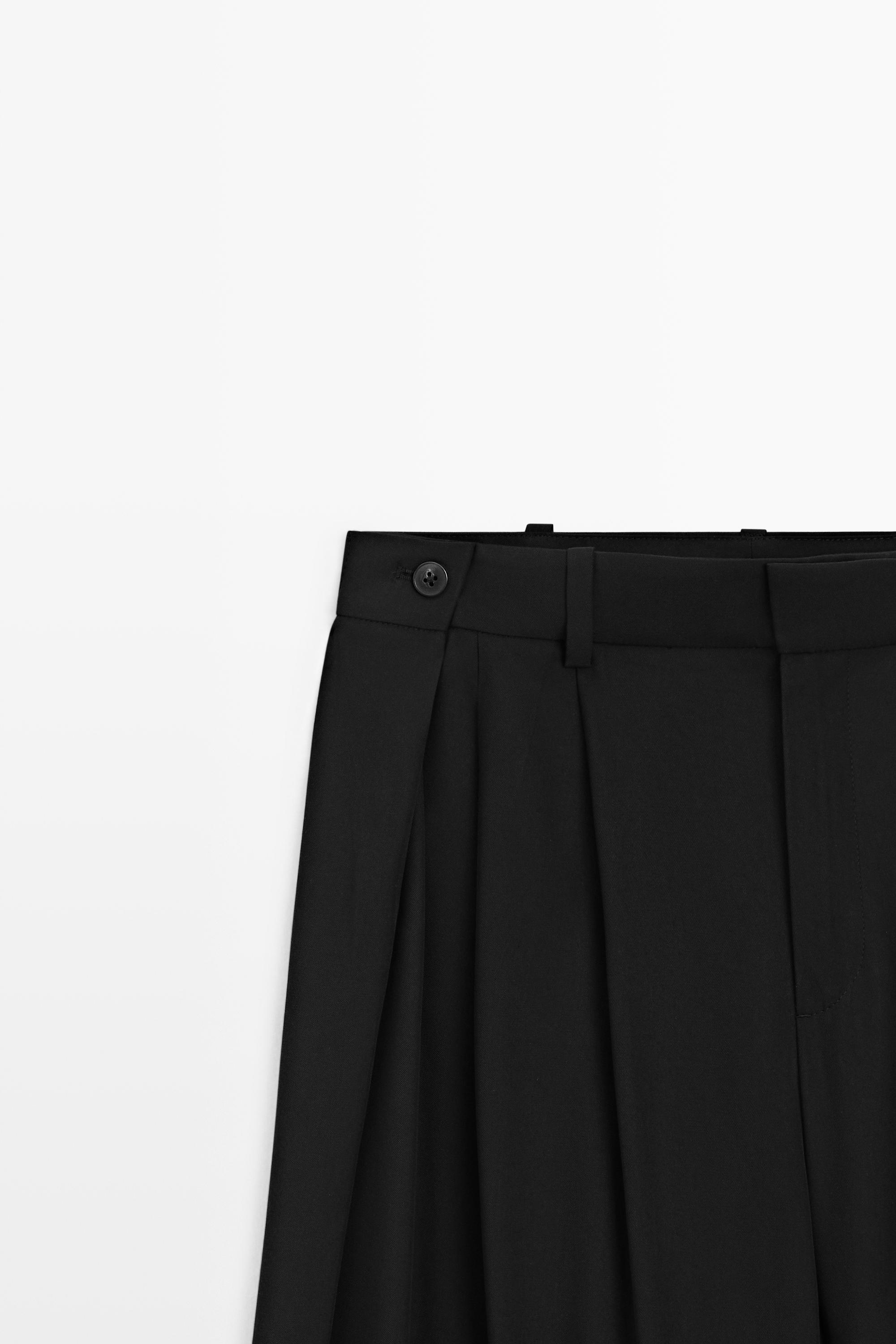 Flowing pleated pants with button detail — BLACK