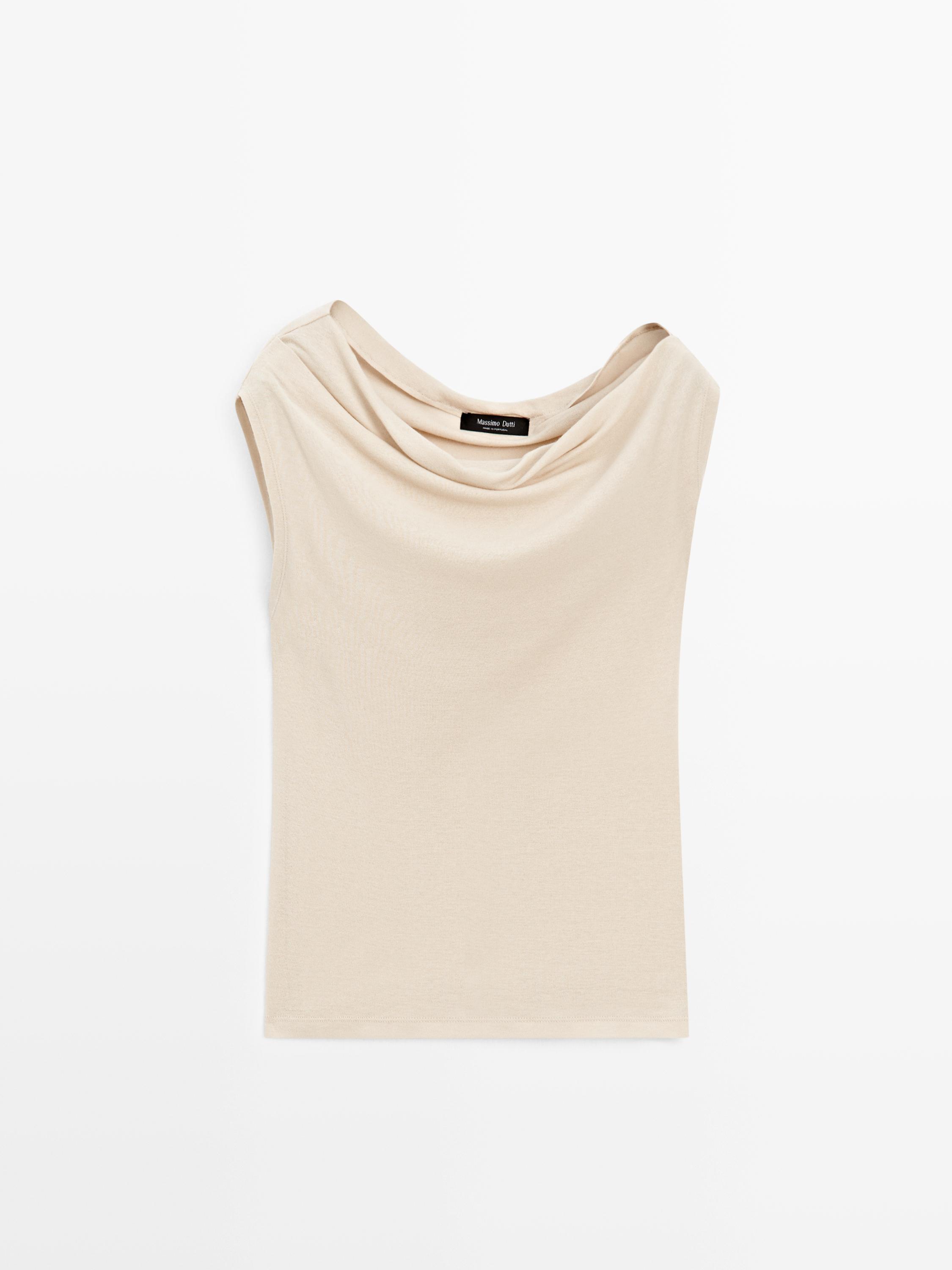 Sleeveless asymmetric top