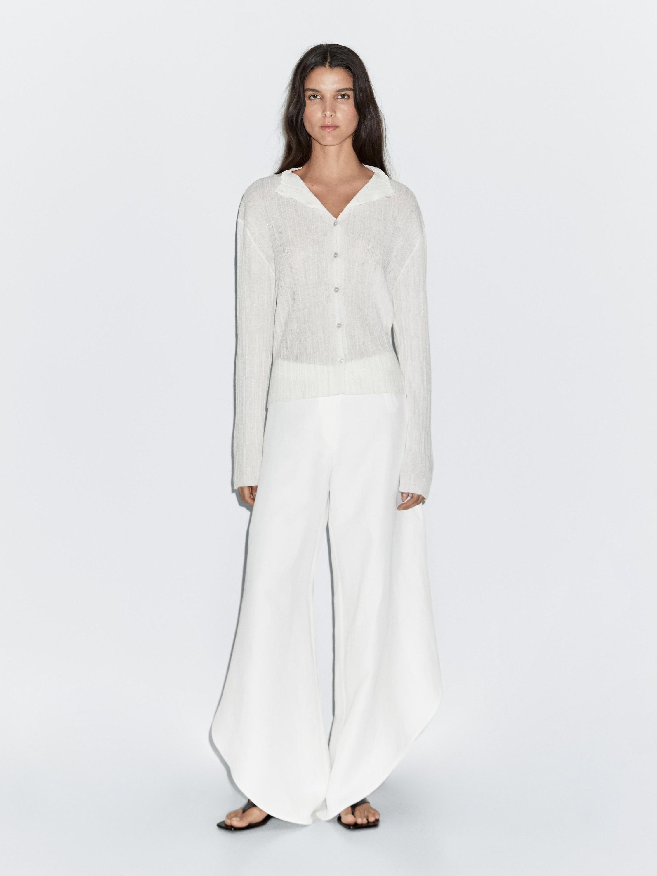 Pantalon fendu dans le bas