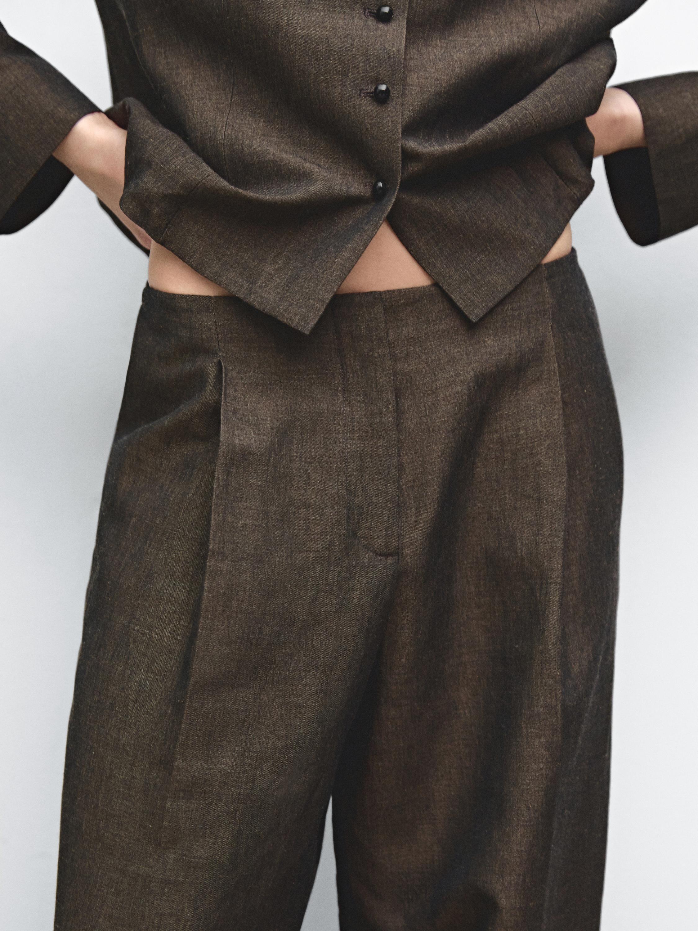 Flowing linen blend trousers with pleats