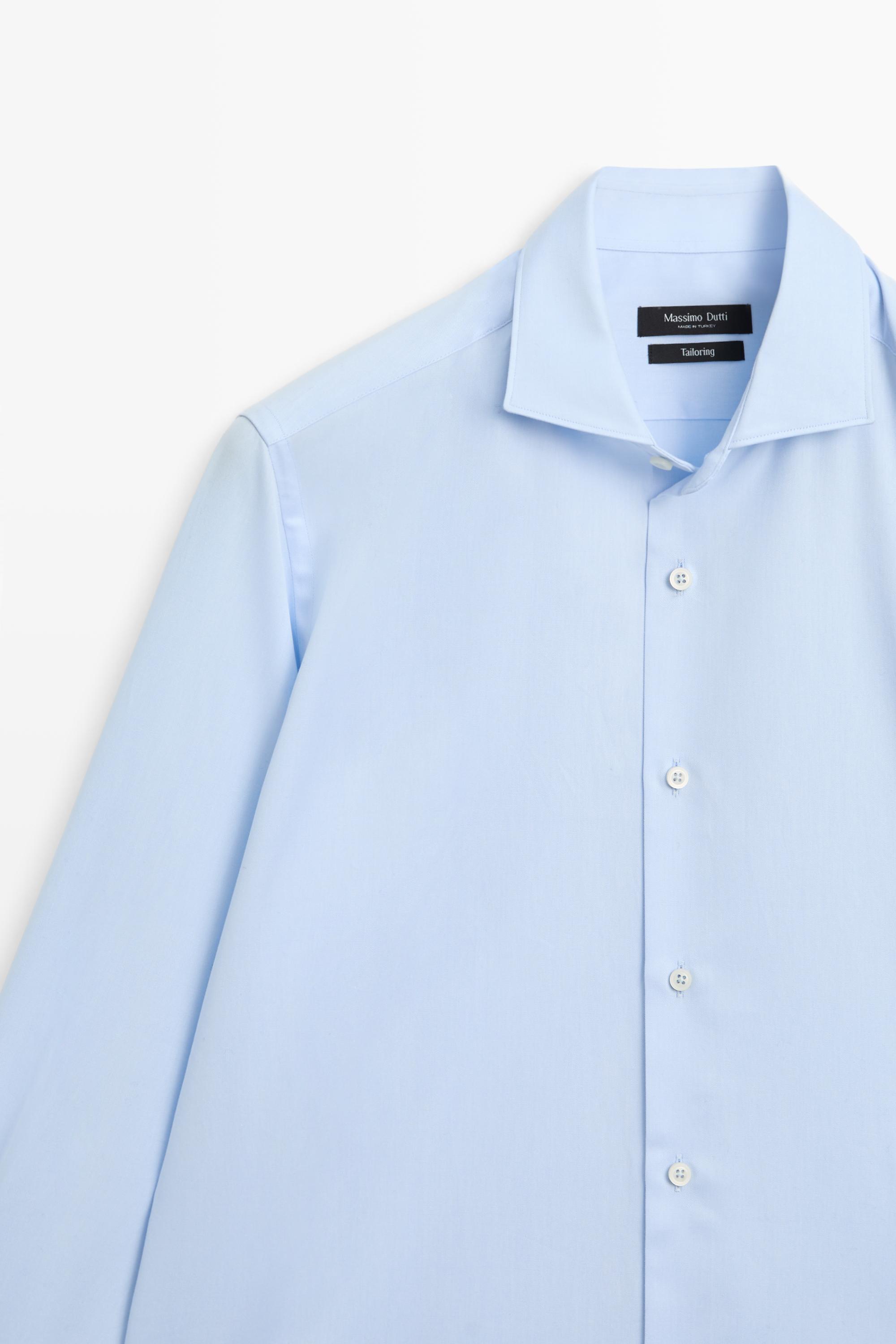 Camisa slim fit doble puño 100% algodón