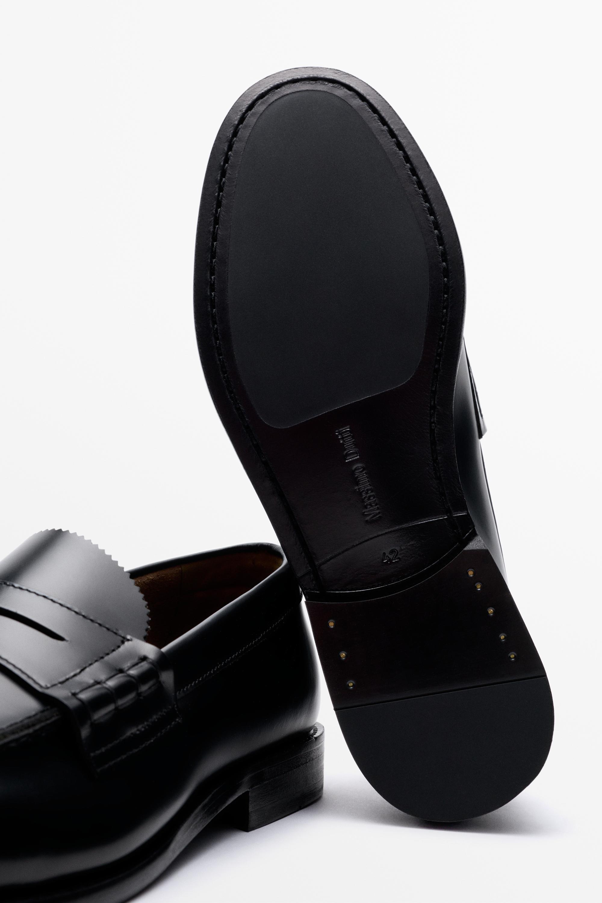 Leather penny loafer — BLACK