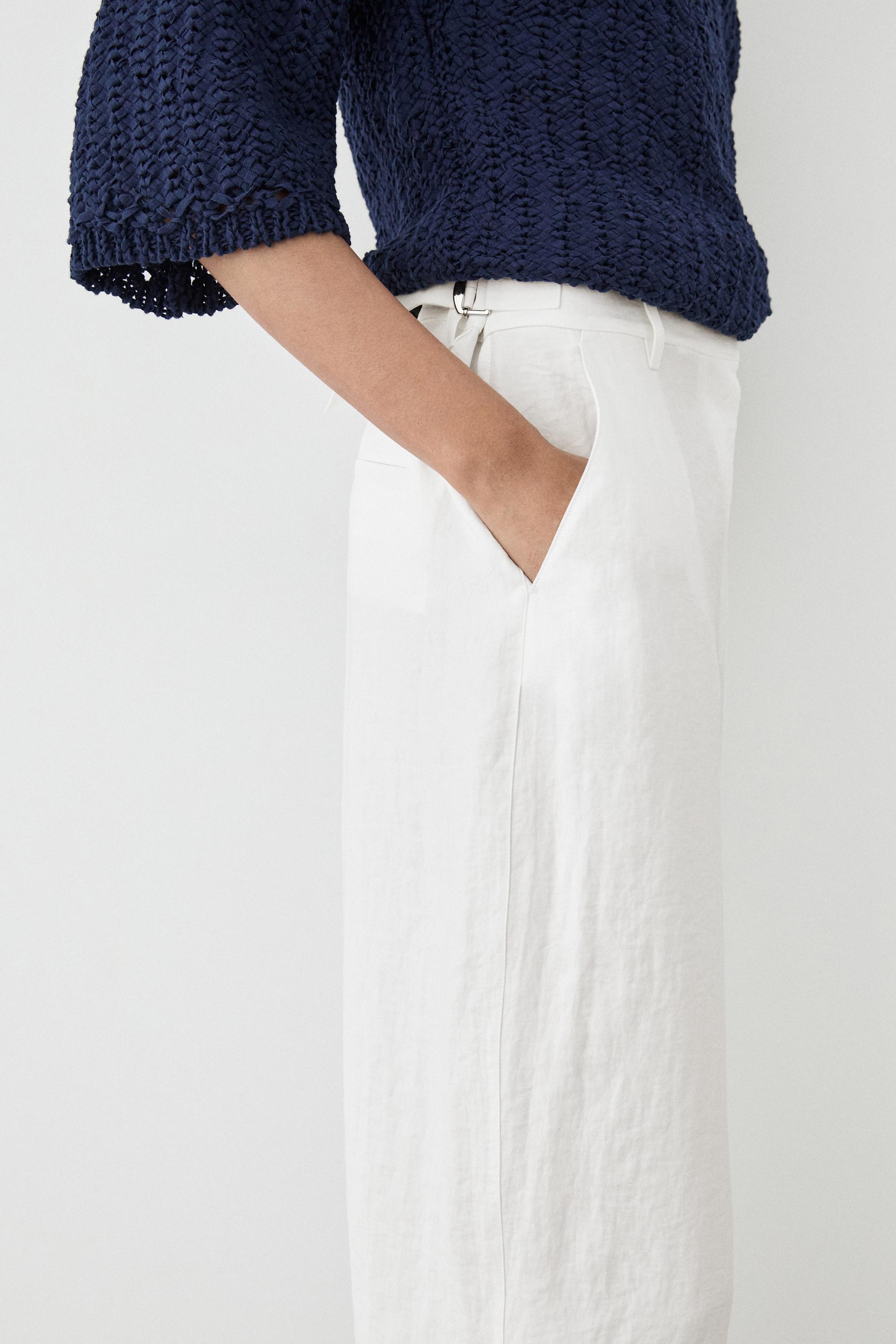 Flowing trousers with buckles — WHITE