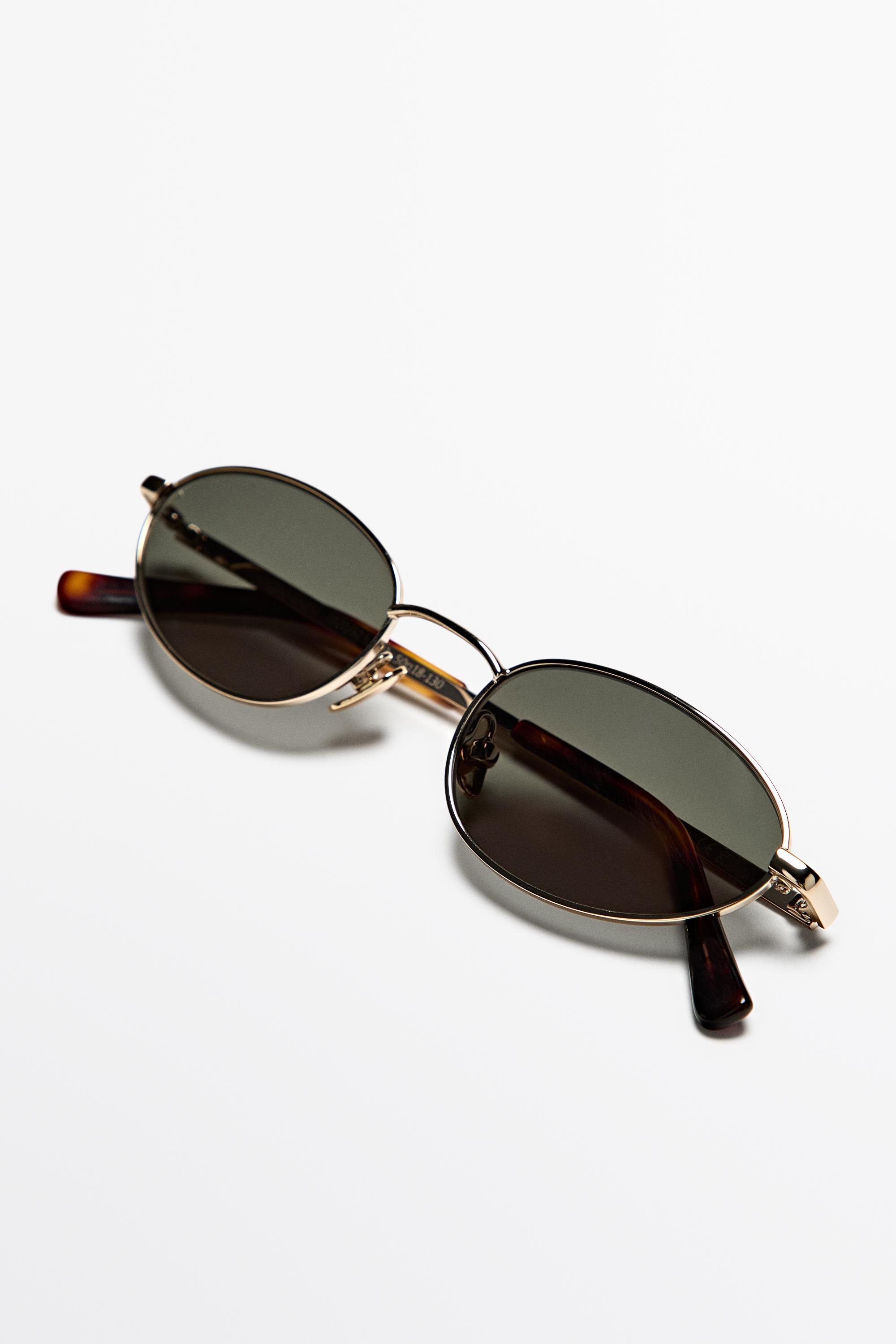 Oval metal sunglasses — GOLDEN