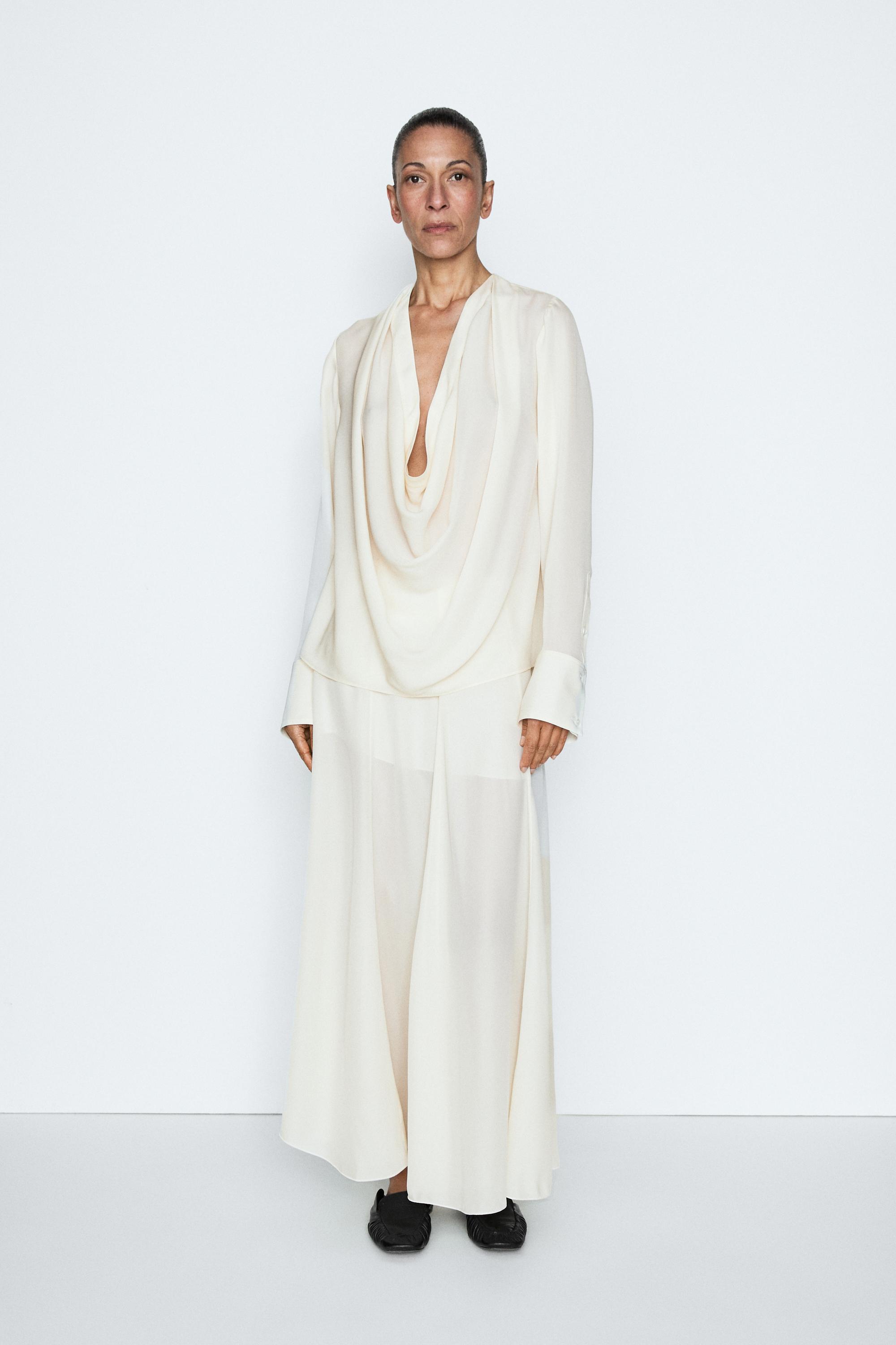 Luźna bluzka z drapowanym dekoltem z jedwabiu - STUDIO