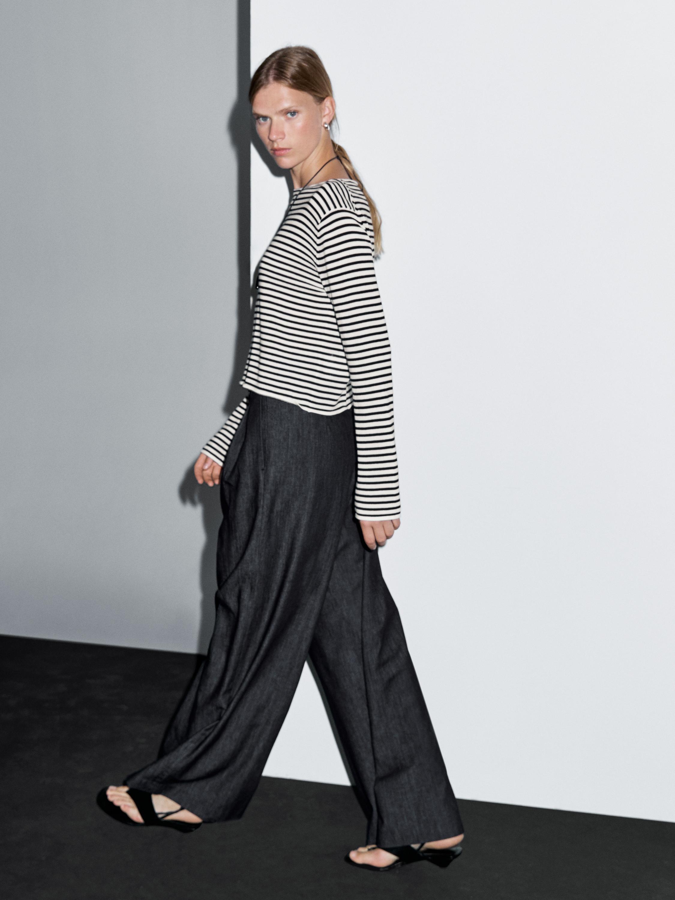 Lekkie jeansy z szerokimi nogawkami i wysokim stanem