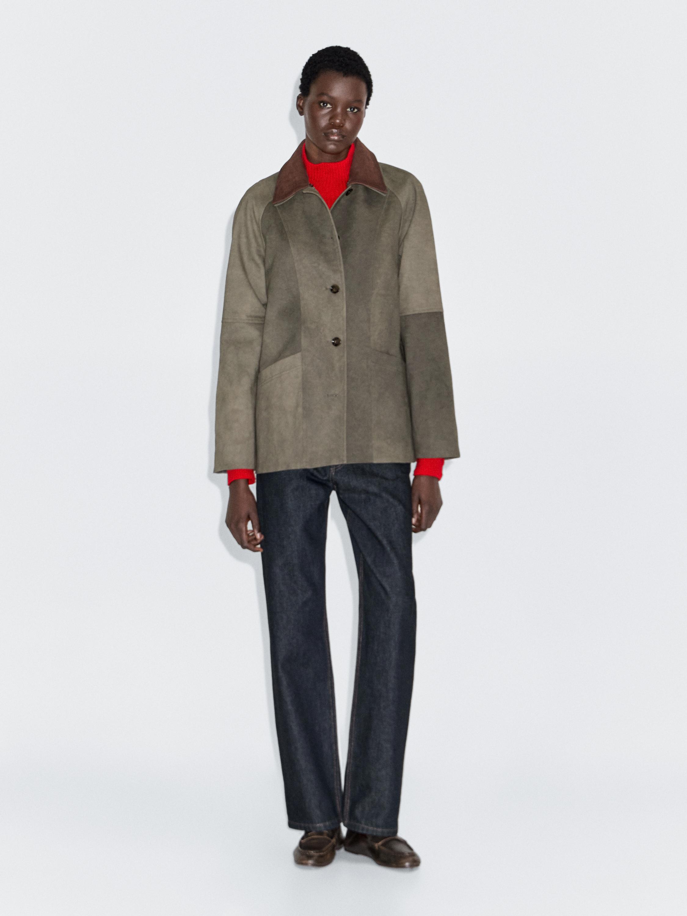 Water-repellent jacket with layered collar