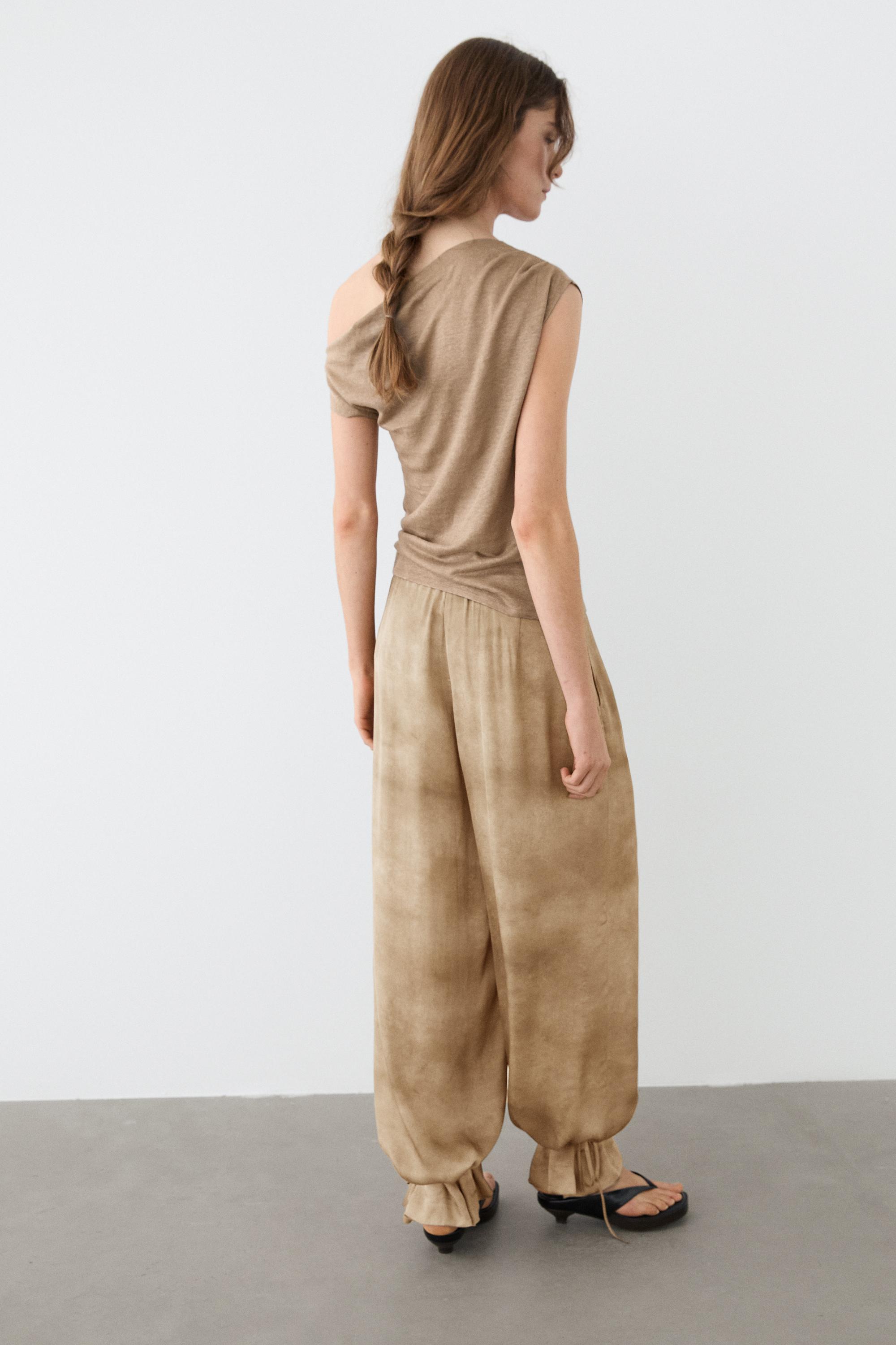 Asymmetric linen blend top with draped detail — Washed