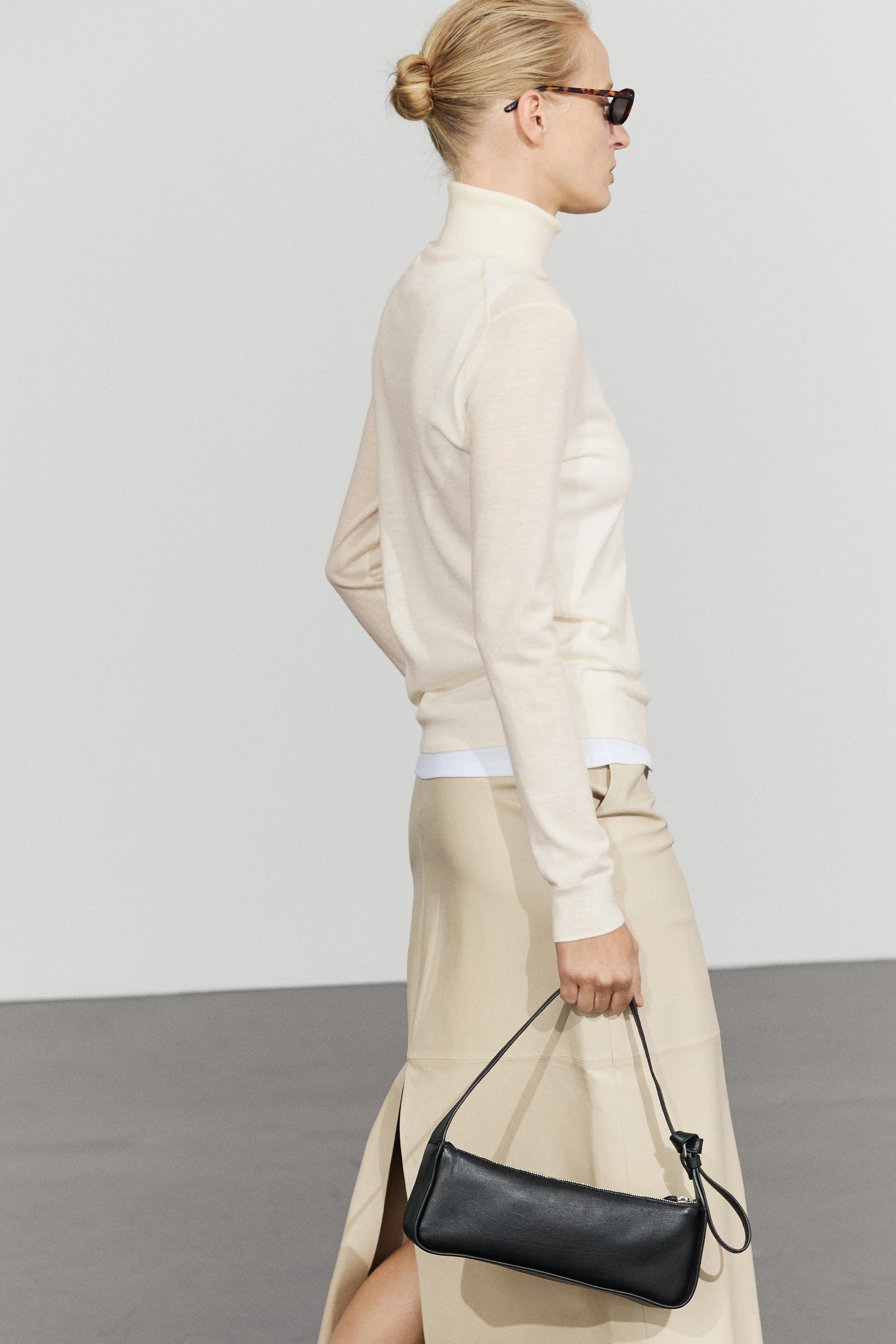 Wool-blend turtleneck knit sweater — CREAM