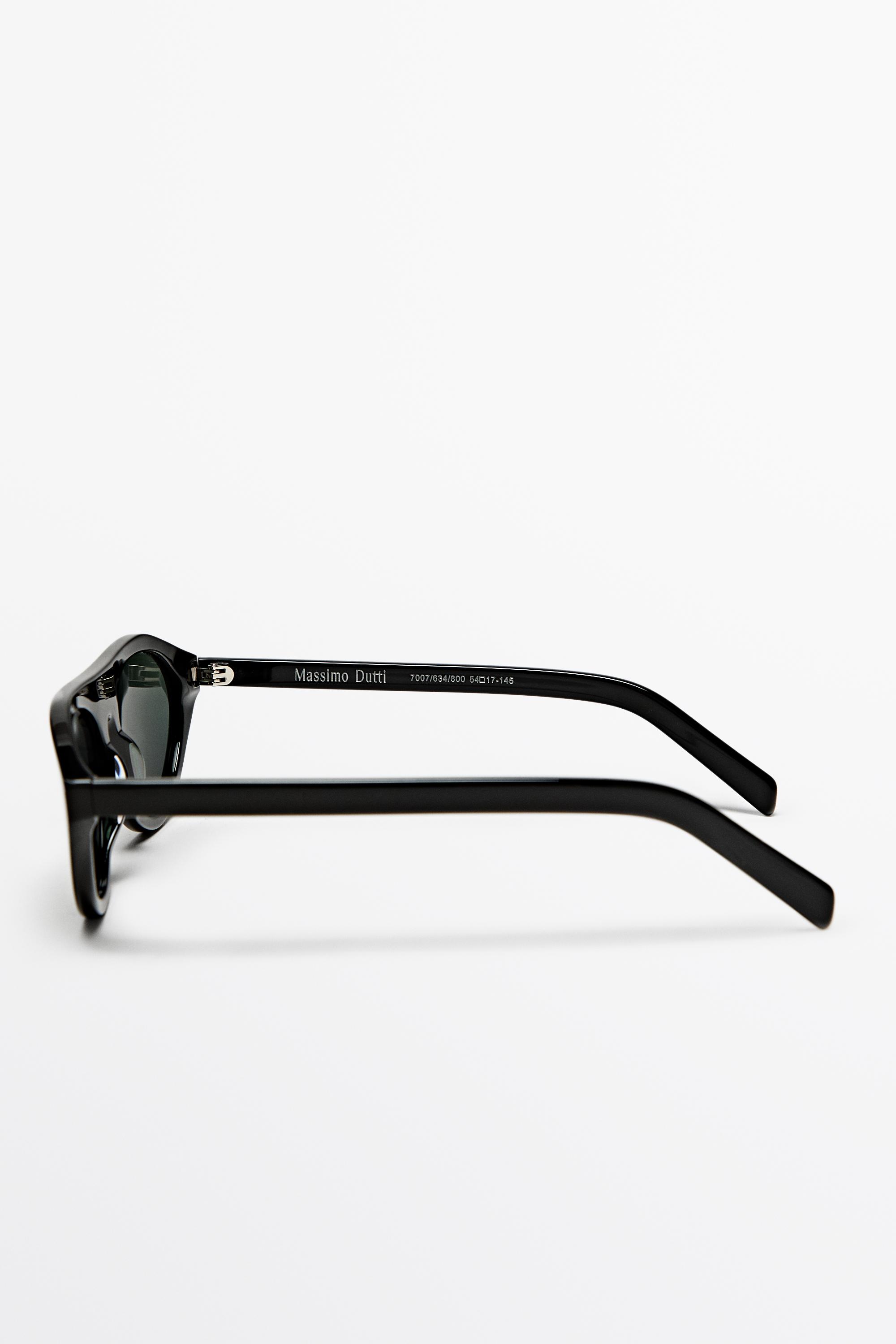 Oval sunglasses — BLACK