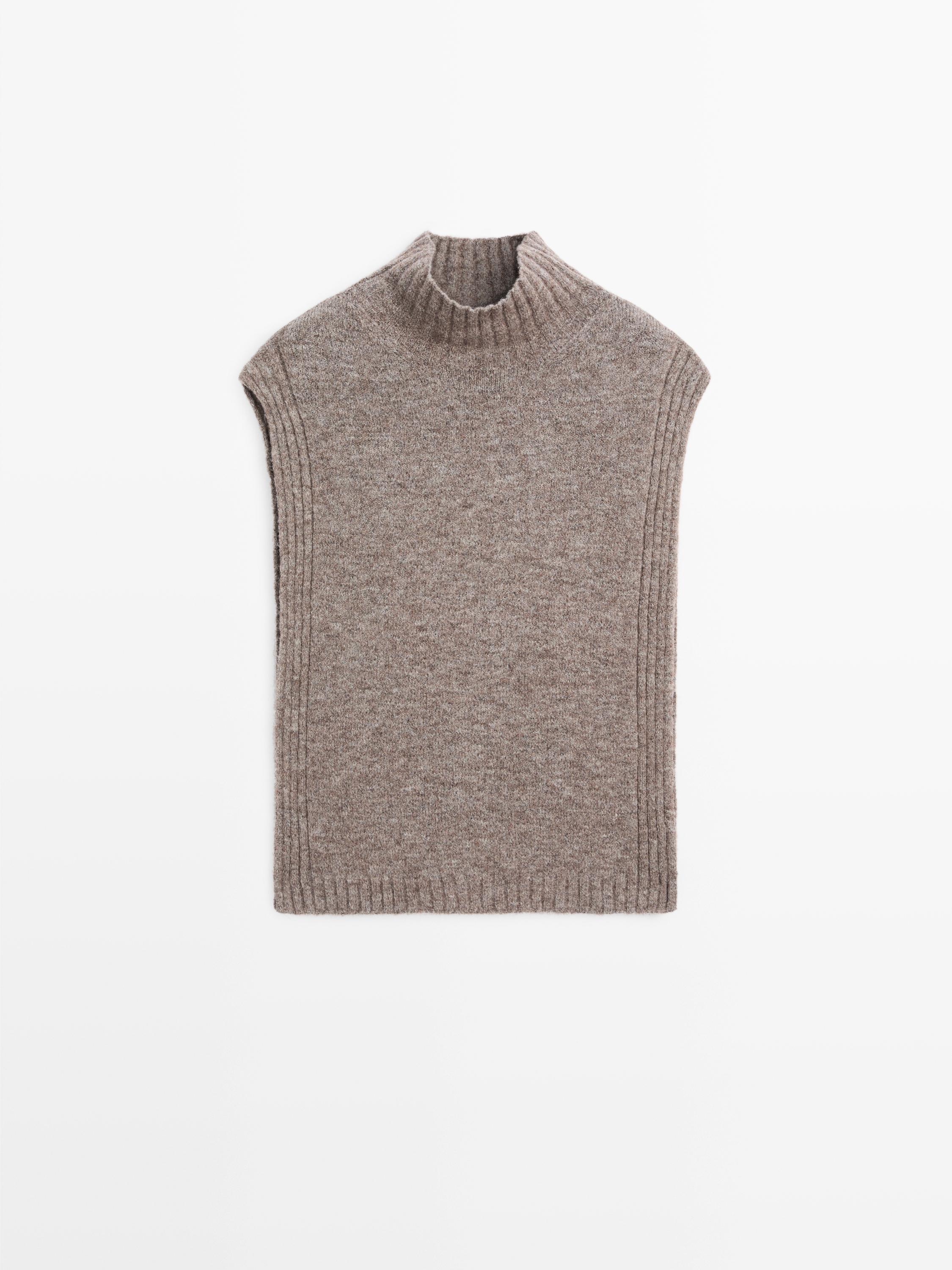 Sleeveless high neck sweater