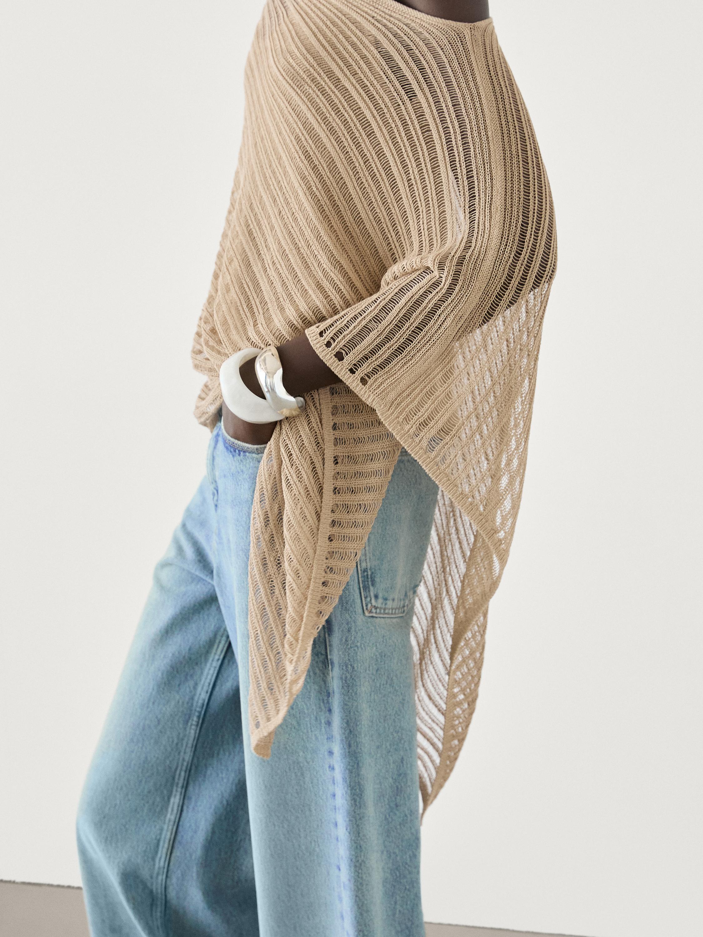 Haut cape asymétrique en maille semi-transparent
