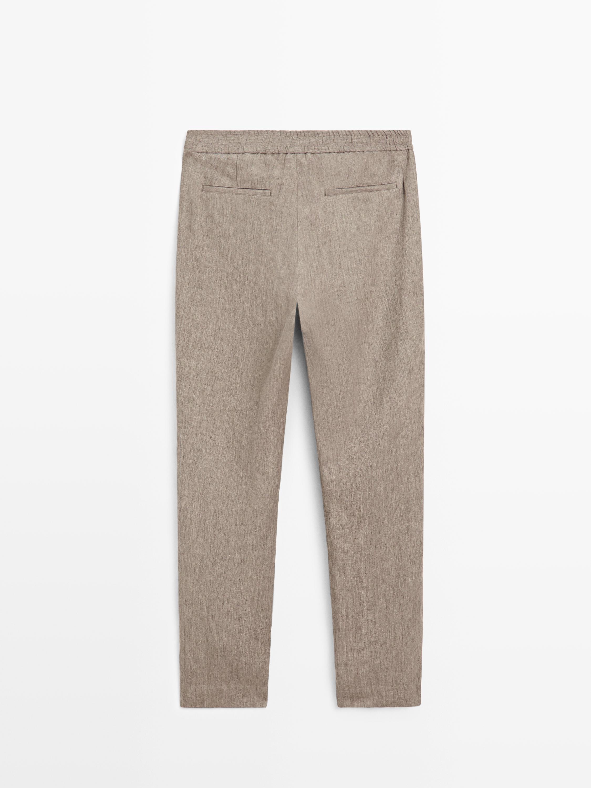 Faded total look linen trousers