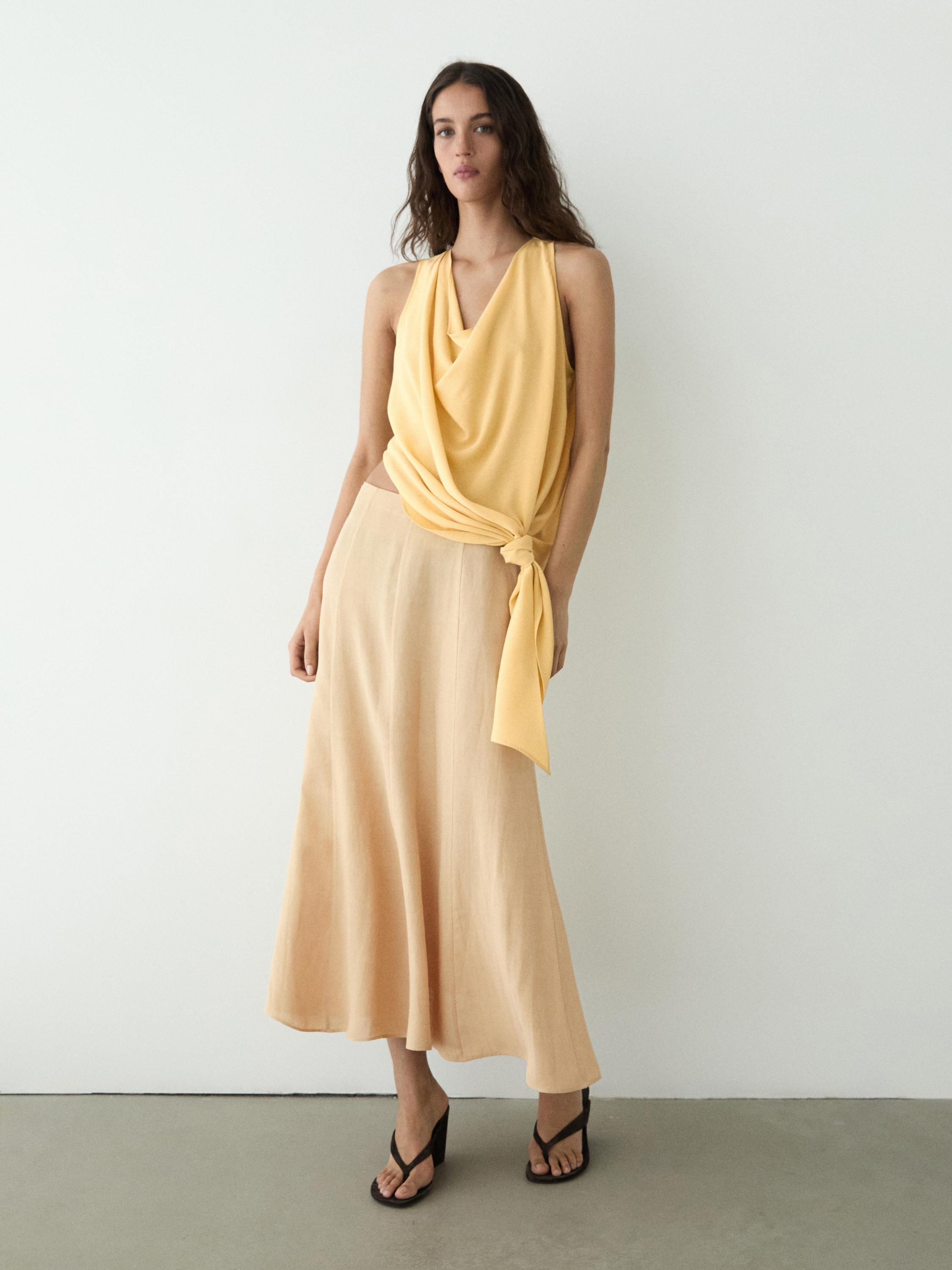 Flowing flared skirt — PALE YELLOW