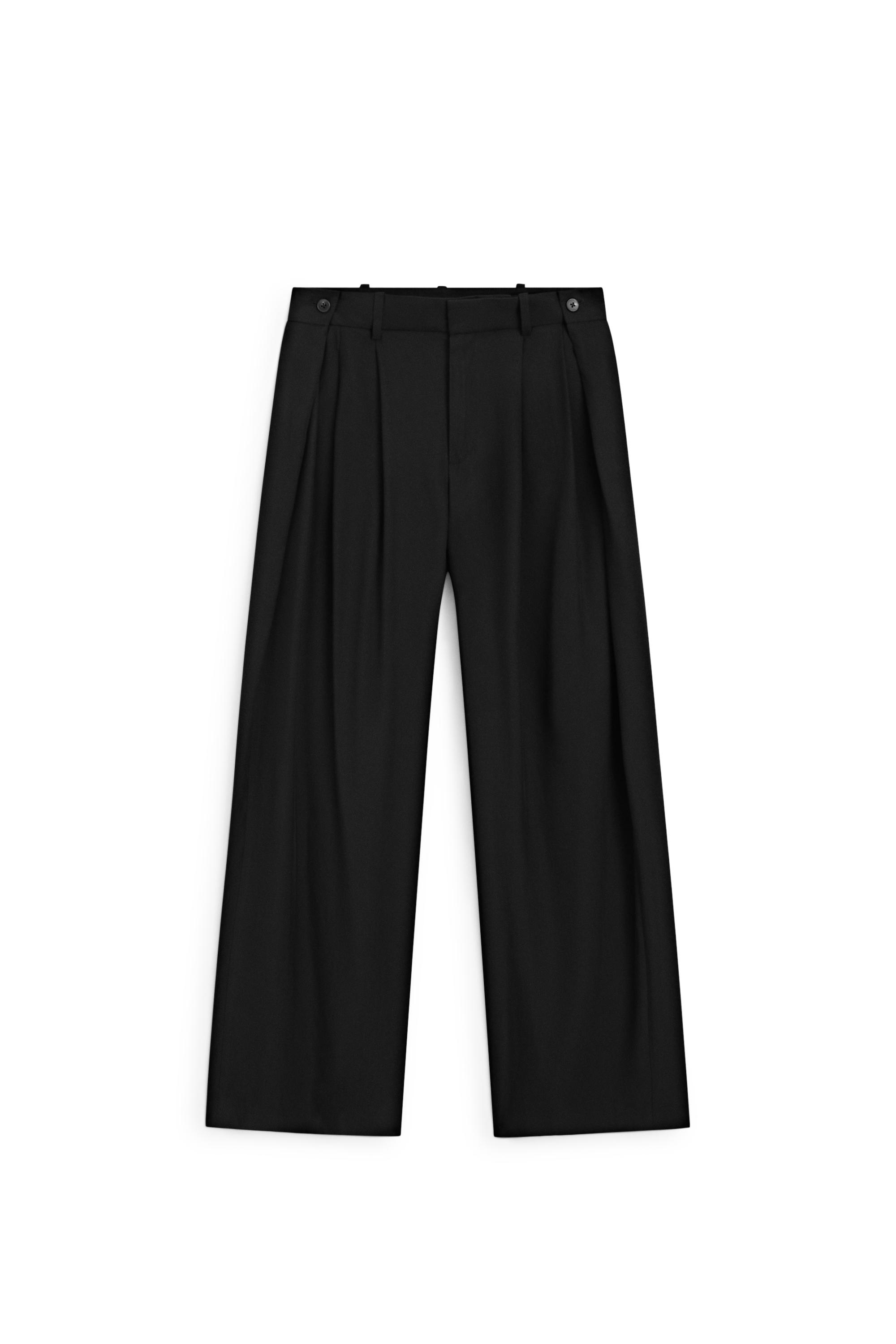 Flowing pleated pants with button detail — BLACK