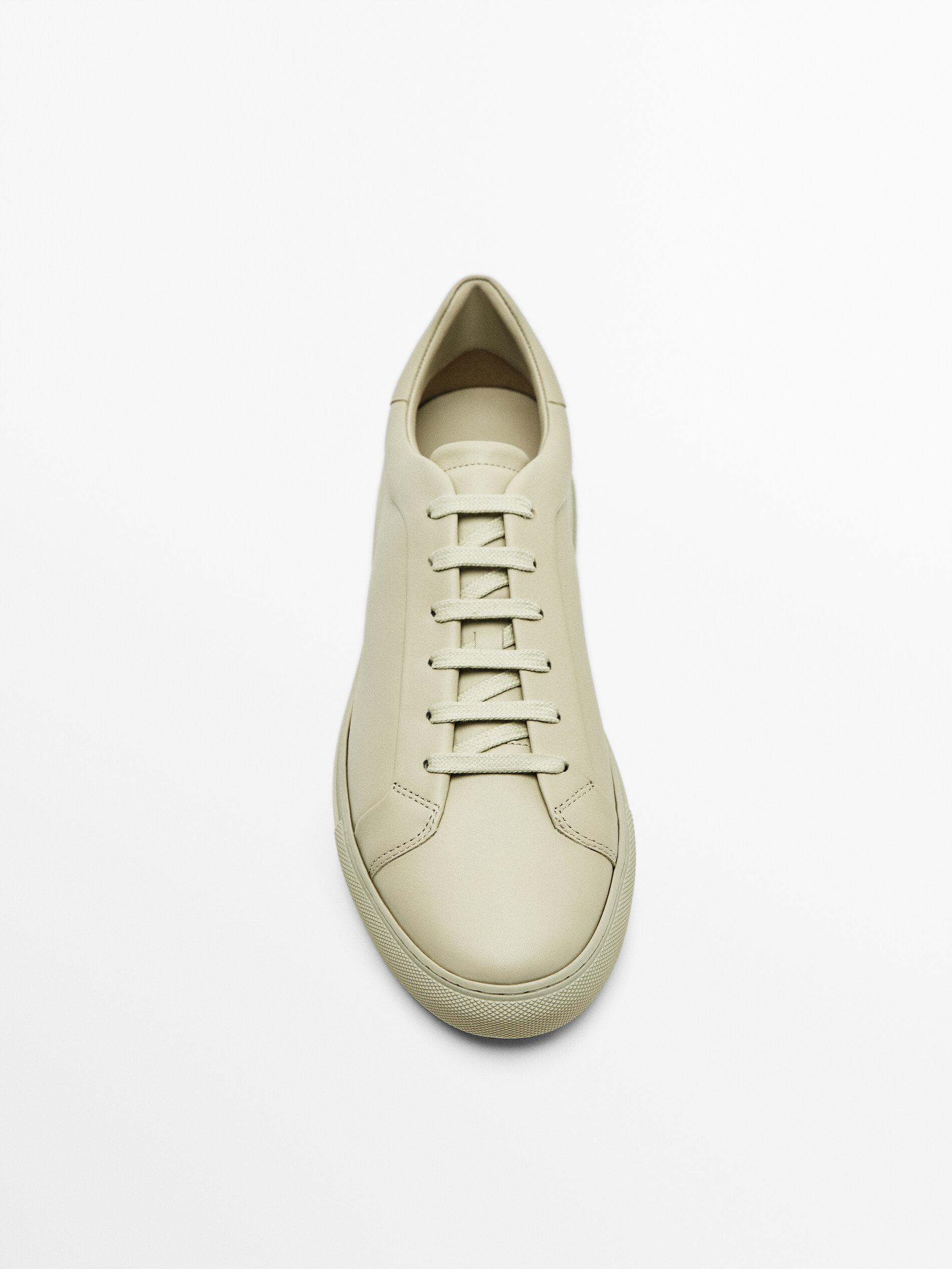 Cream leather trainers