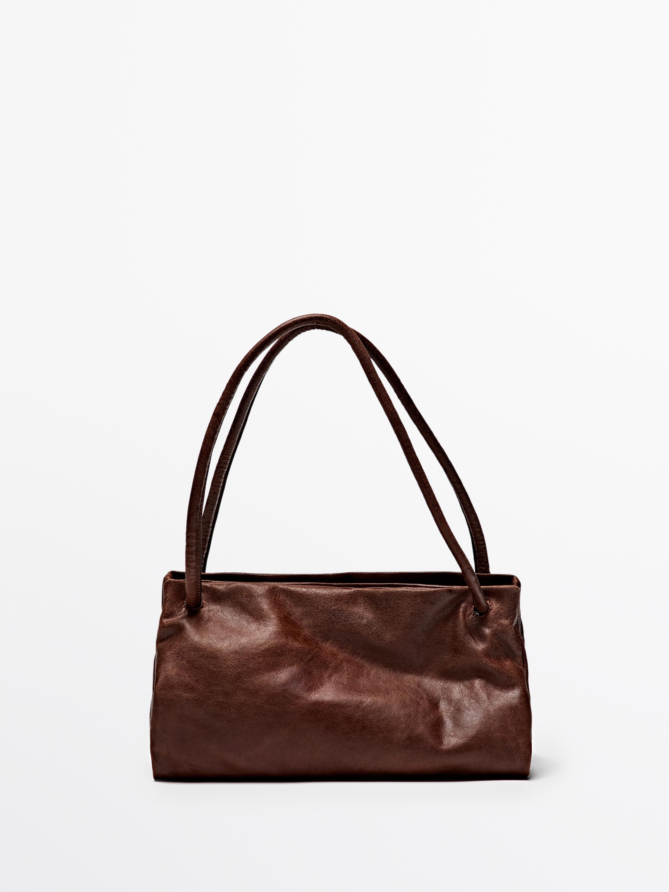 Small nappa leather bag with compartments