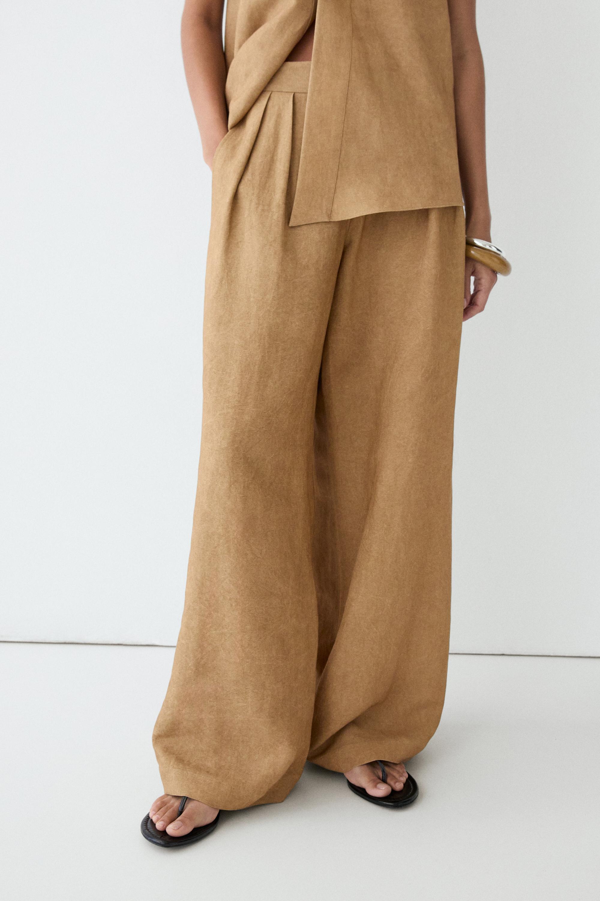 Wide-leg pleated linen blend trousers · Washed · Trousers
