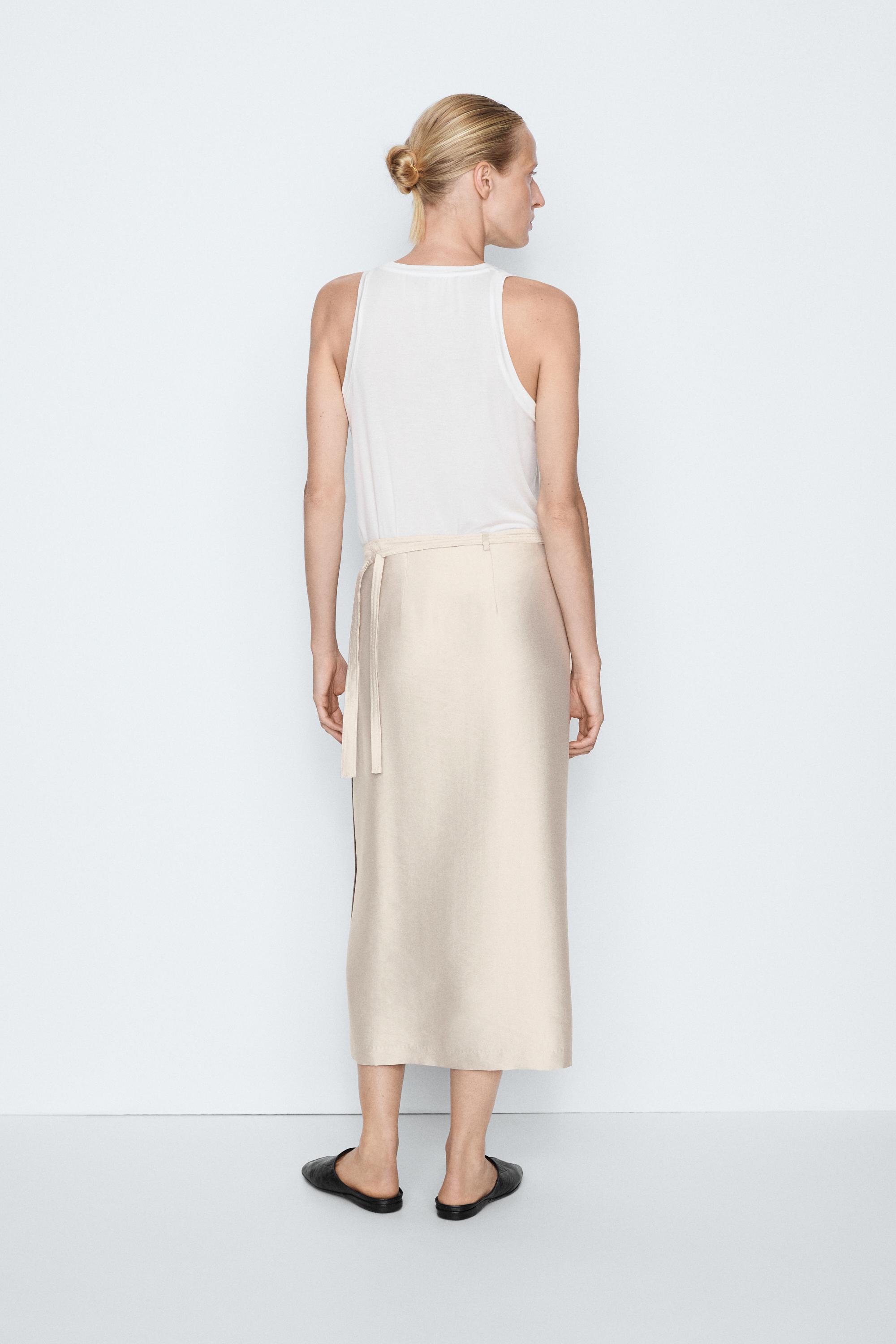 Fluid pocket-detail skirt - STUDIO — STONE
