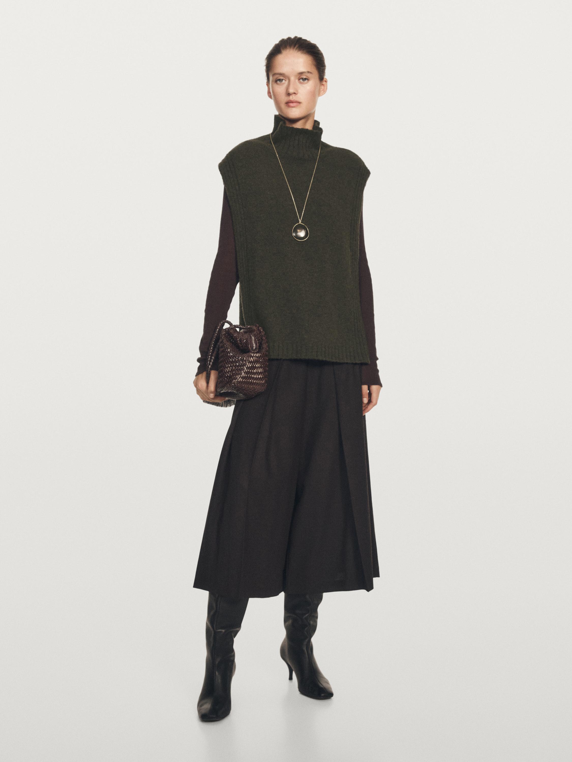 Sleeveless high neck sweater