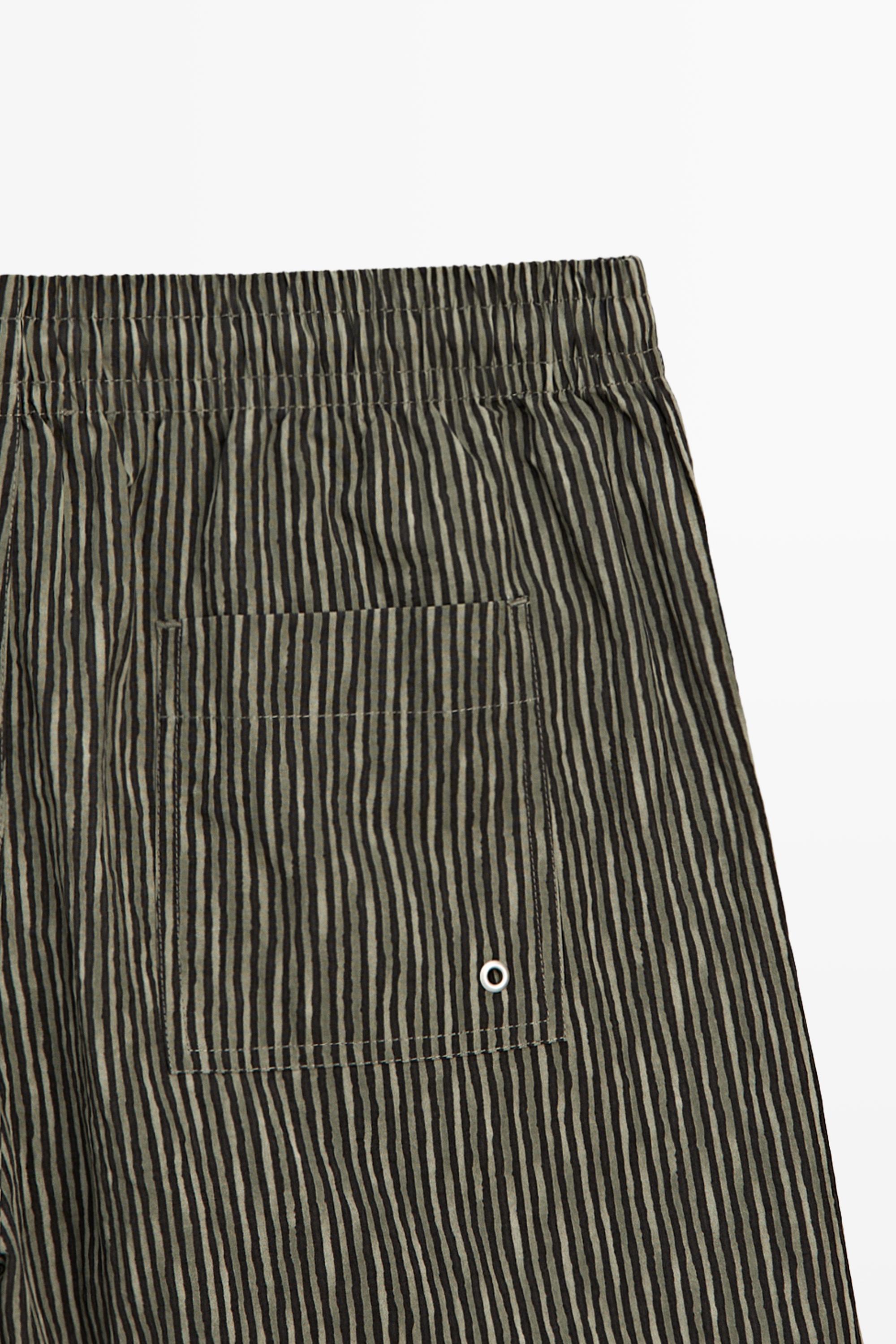 Striped print swimming trunks — KHAKI