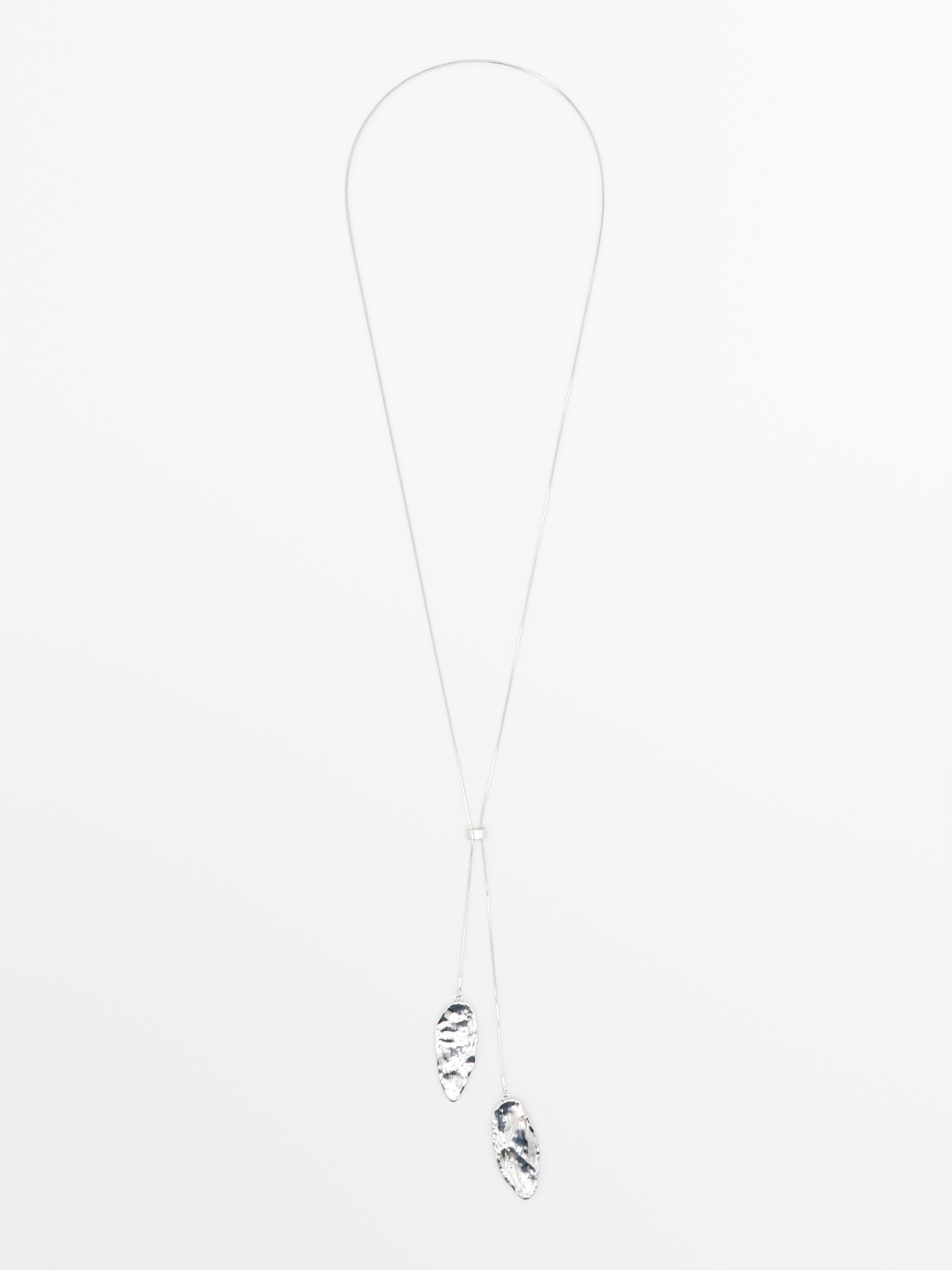 Adjustable necklace with textured pieces