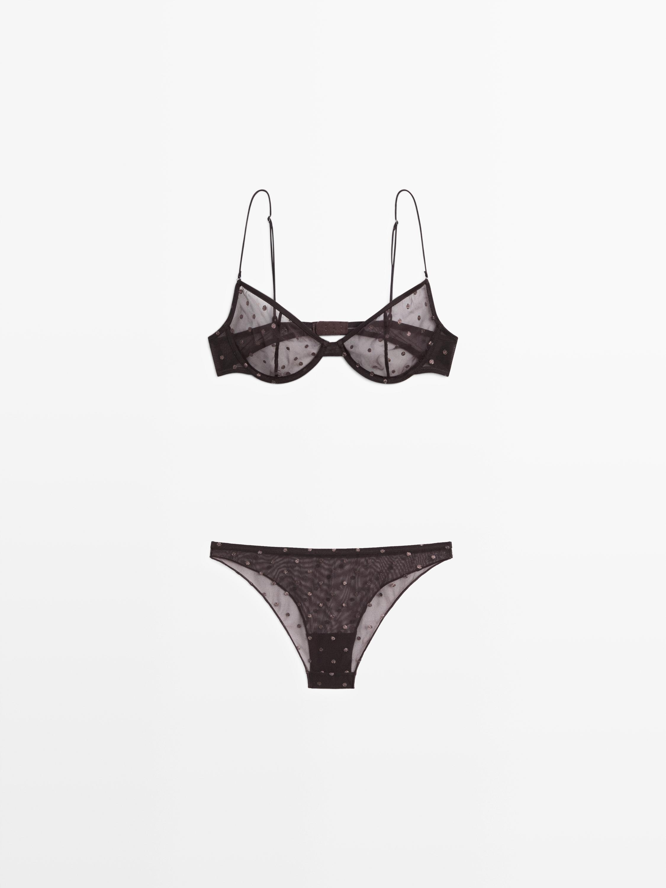 Conjunt de sostenidor i calceta marró talp amb estampat de llunars i tirants fins.