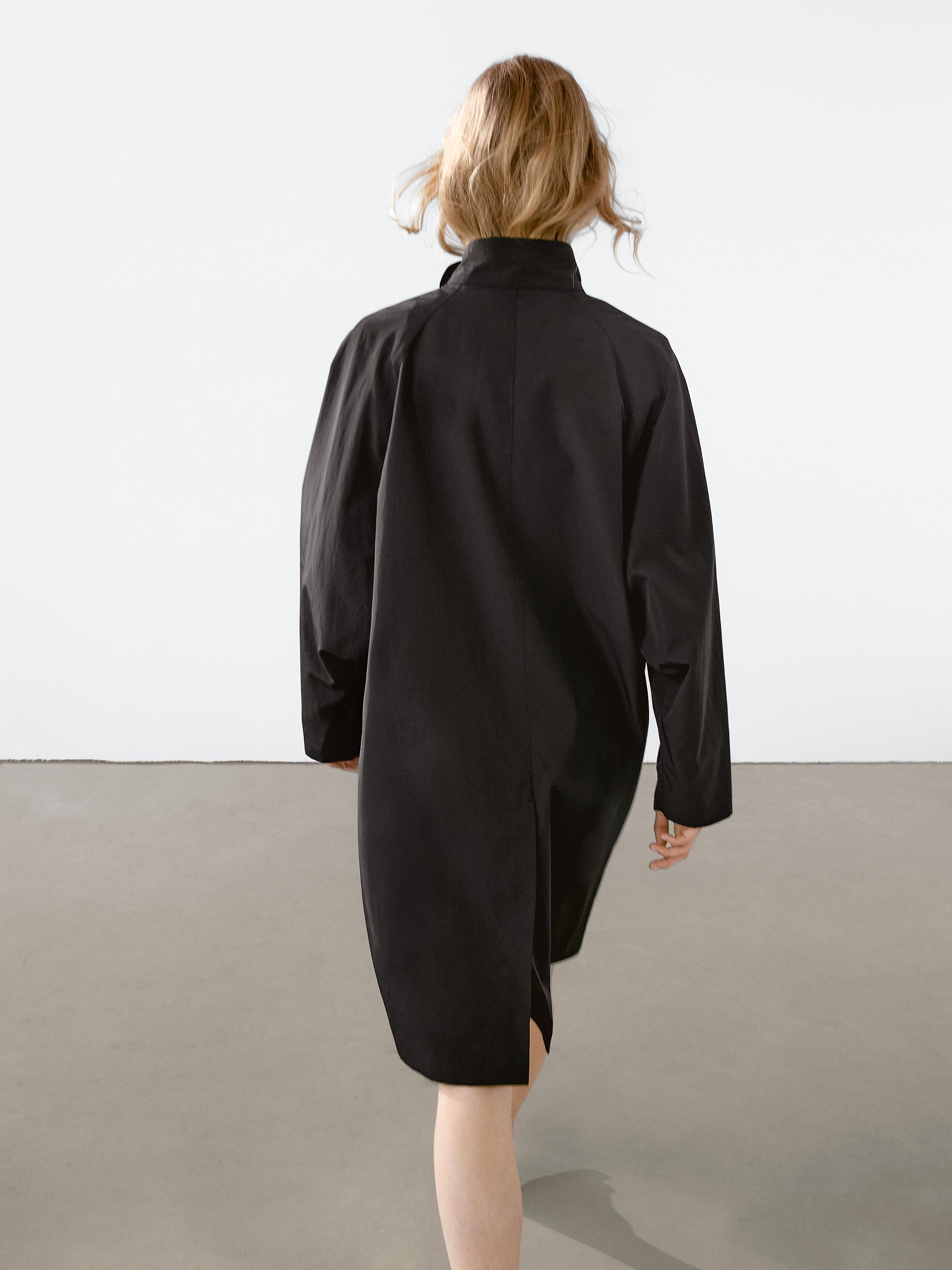 Oversize flowing trench coat in water-repellent fabric