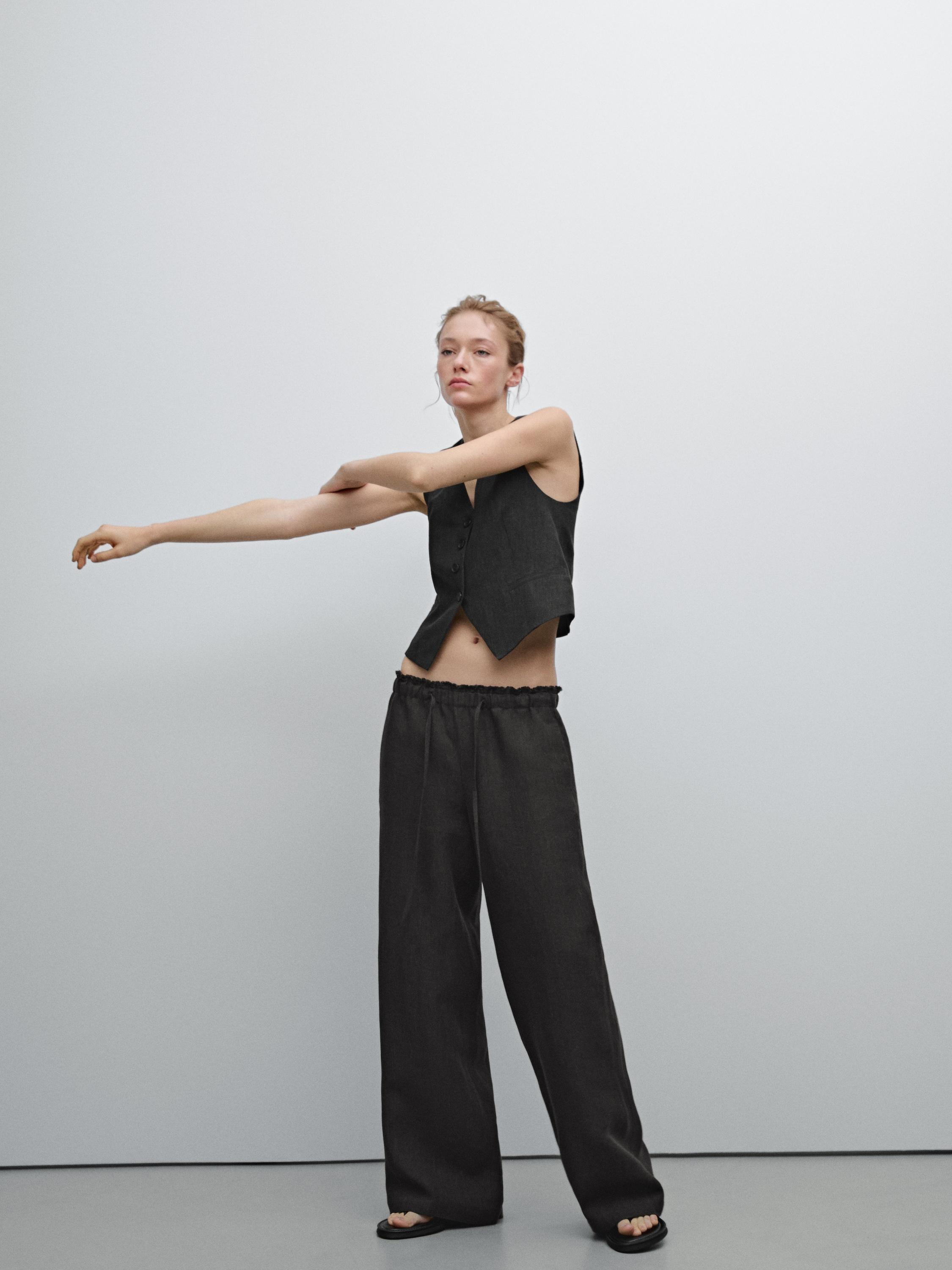 Linen suit trousers with frayed detail