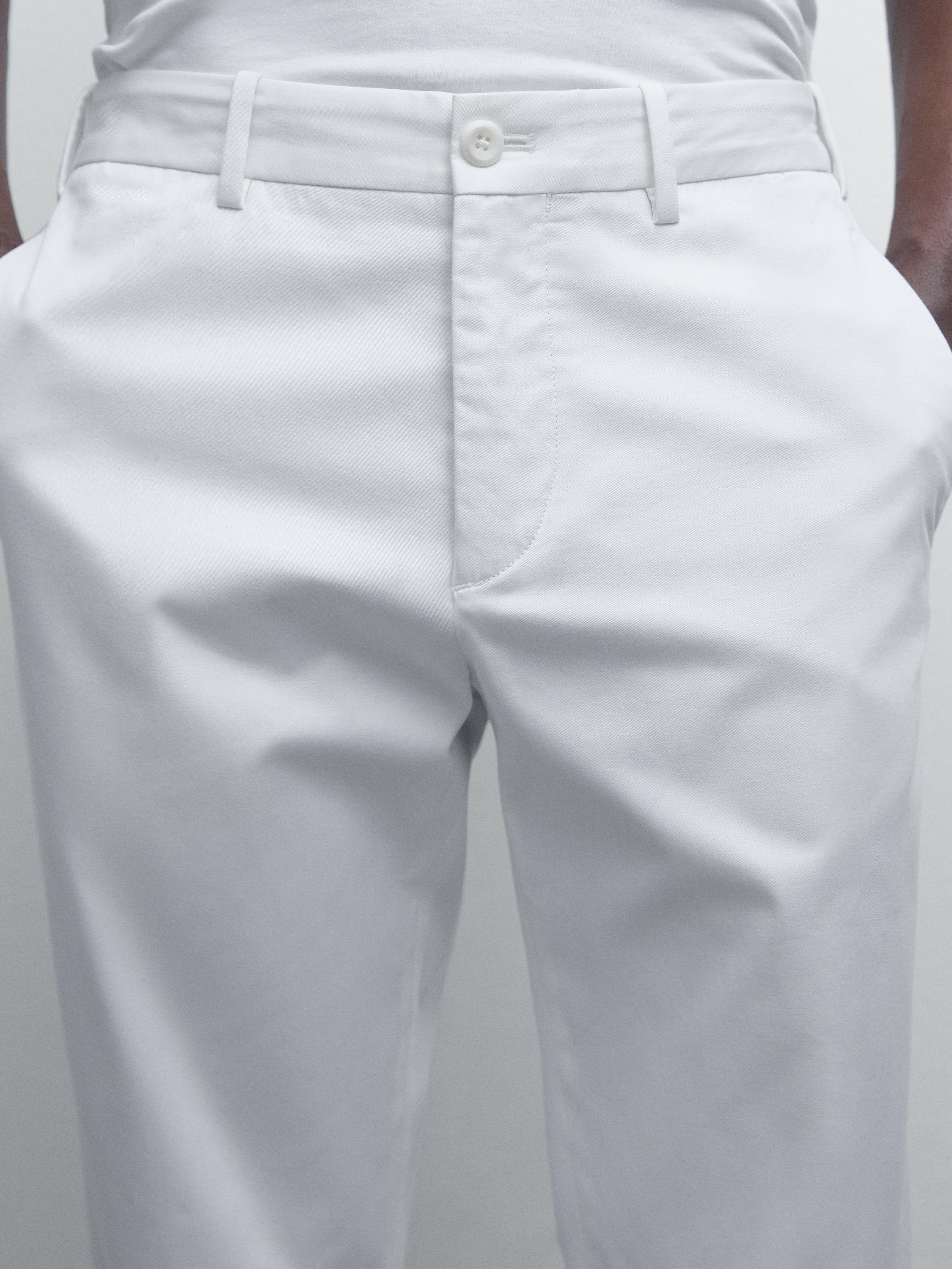 Pantaloni slim fit din amestec de bumbac