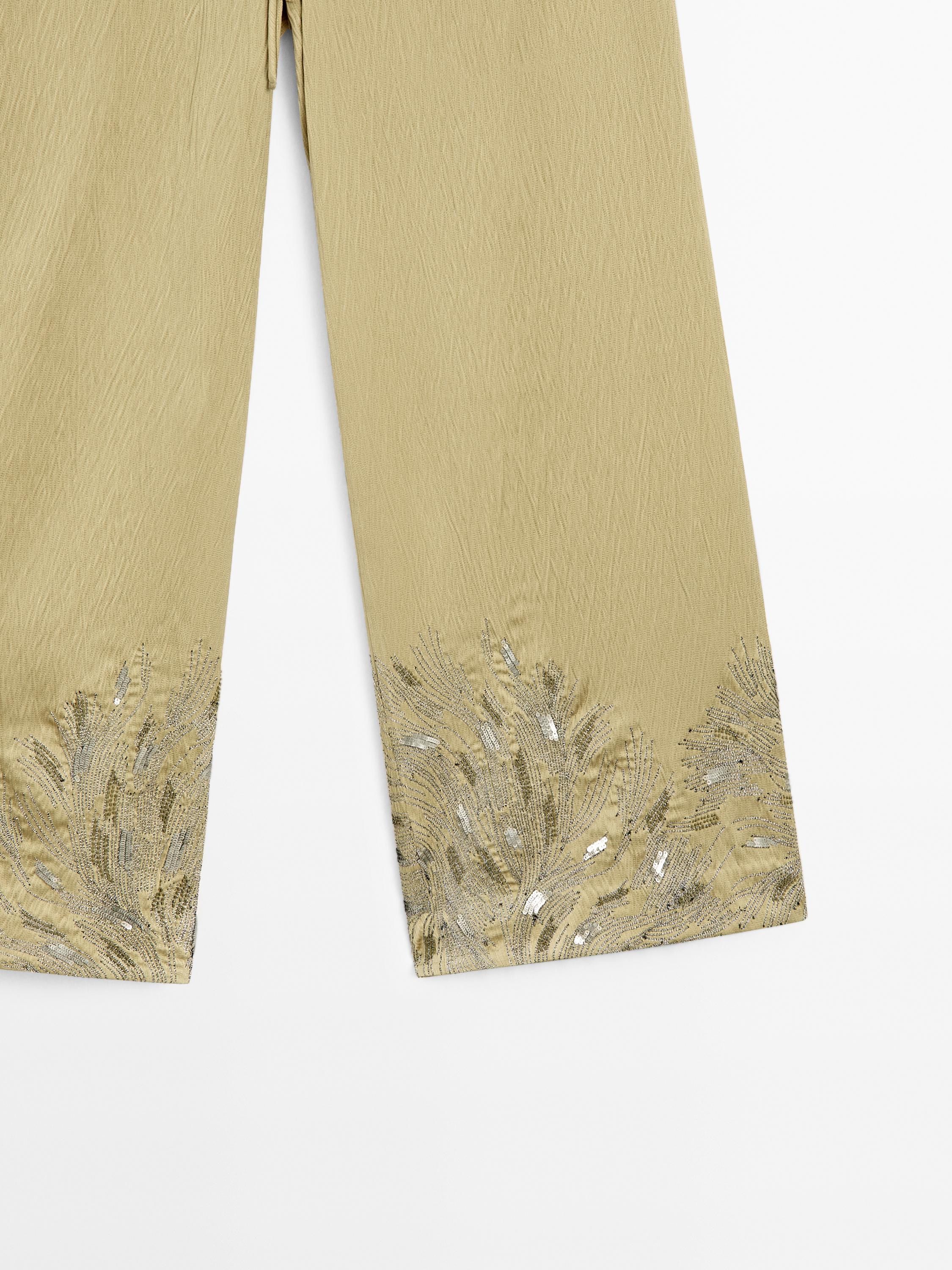 Flowing wide-leg embroidered trousers