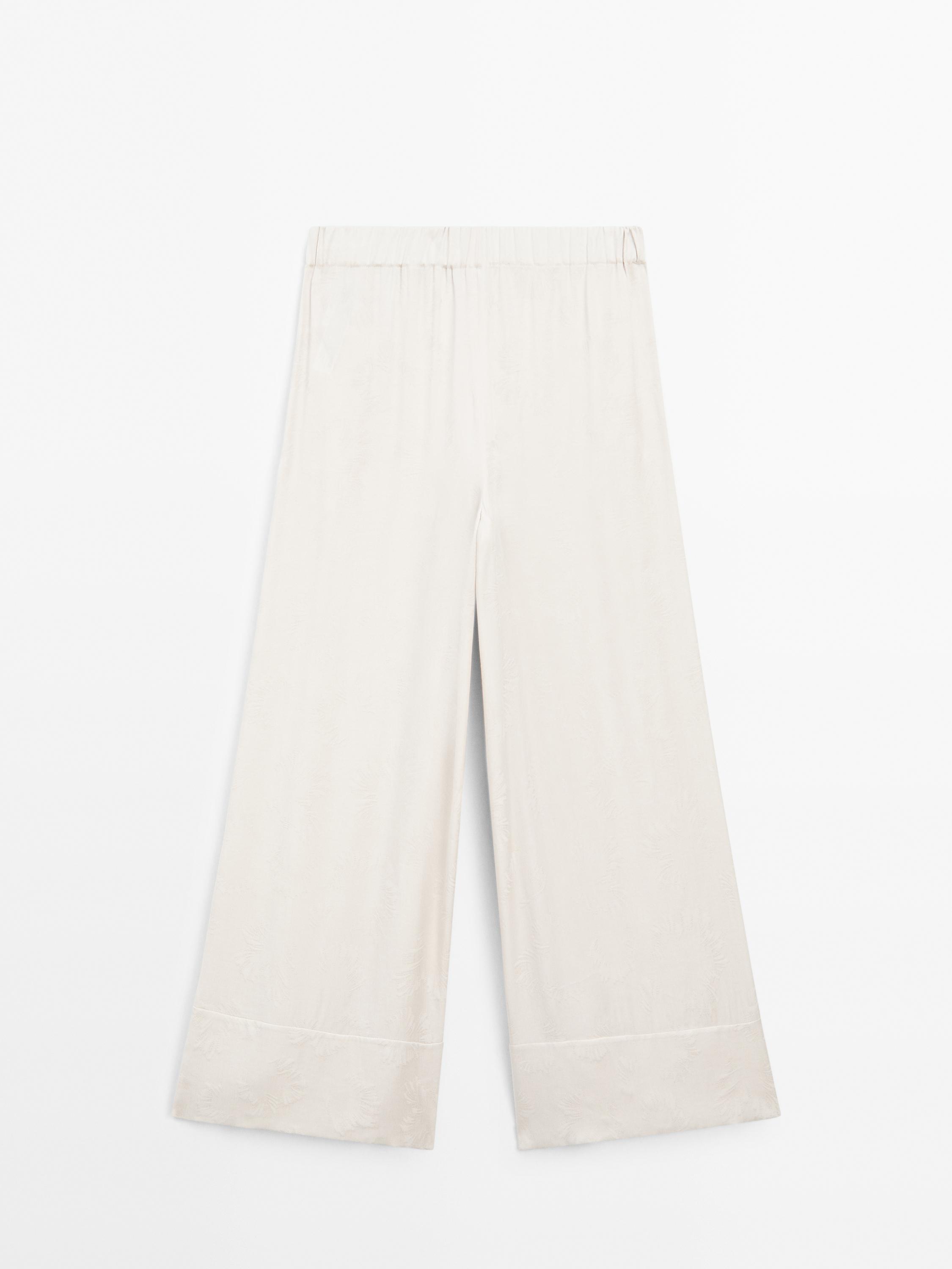 Printed fabric trousers with hem detail
