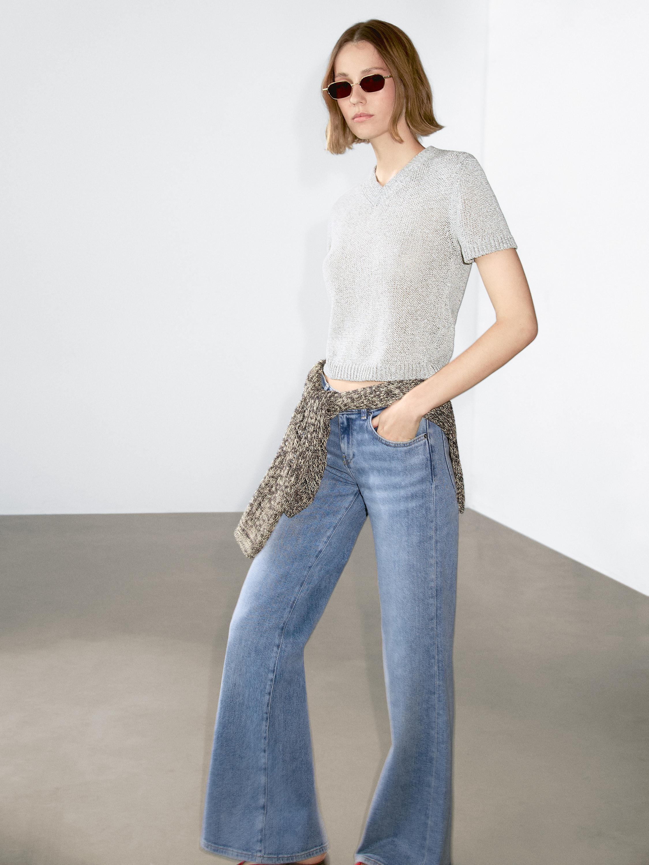 Knit sweater with fabric detail