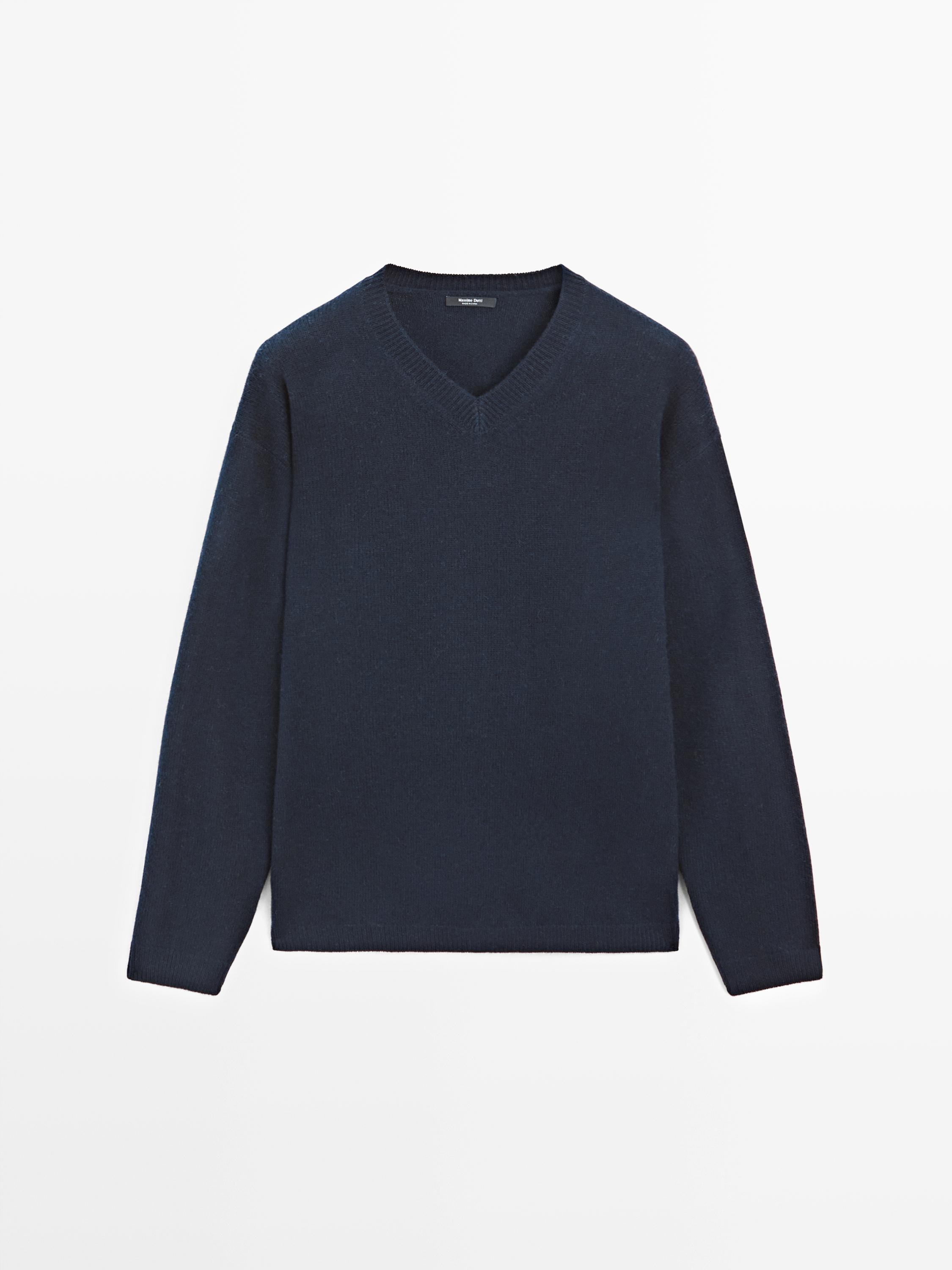 Jersey punto oversize cuello pico