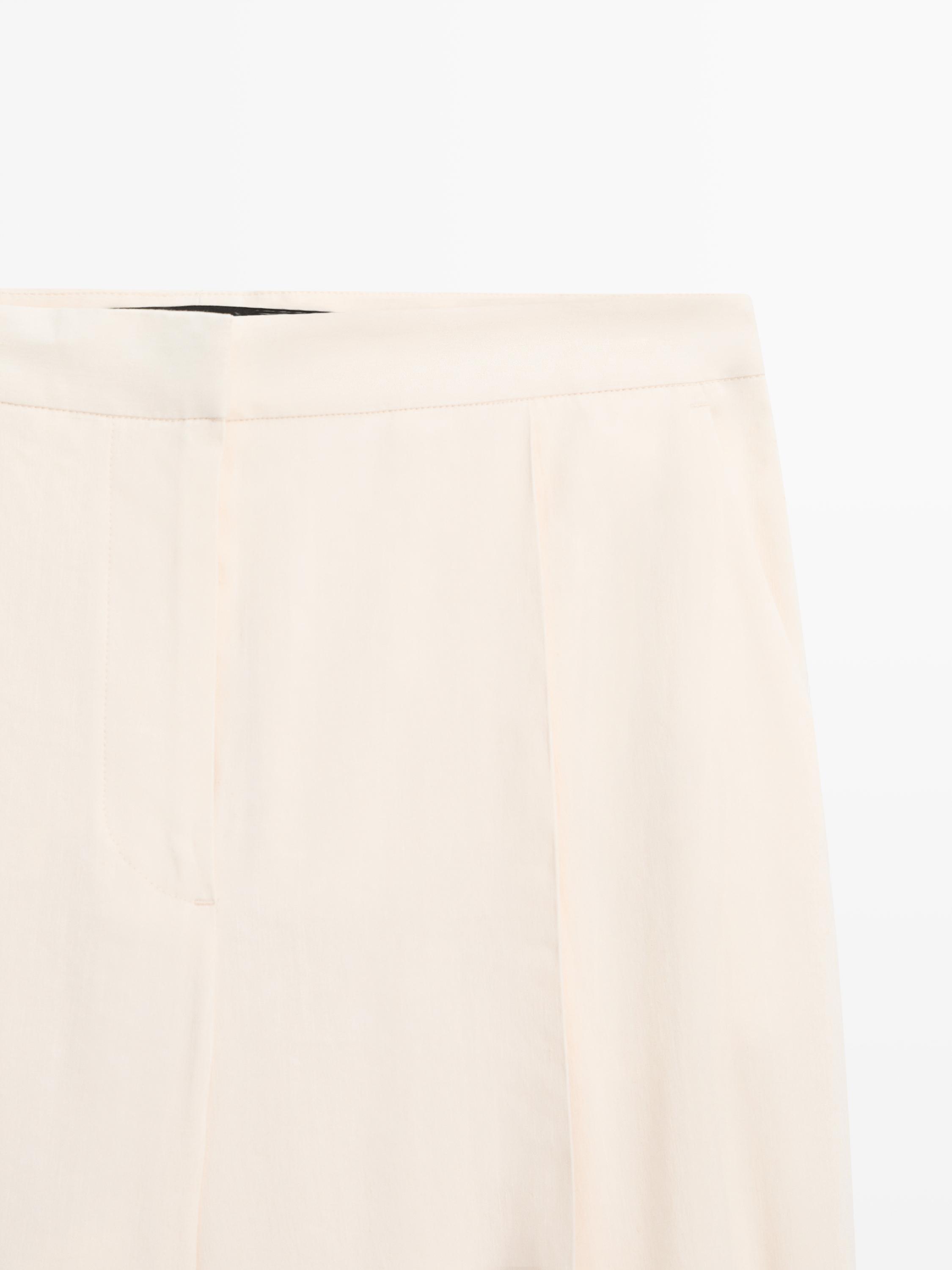 Flowing barrel fit trousers — CREAM